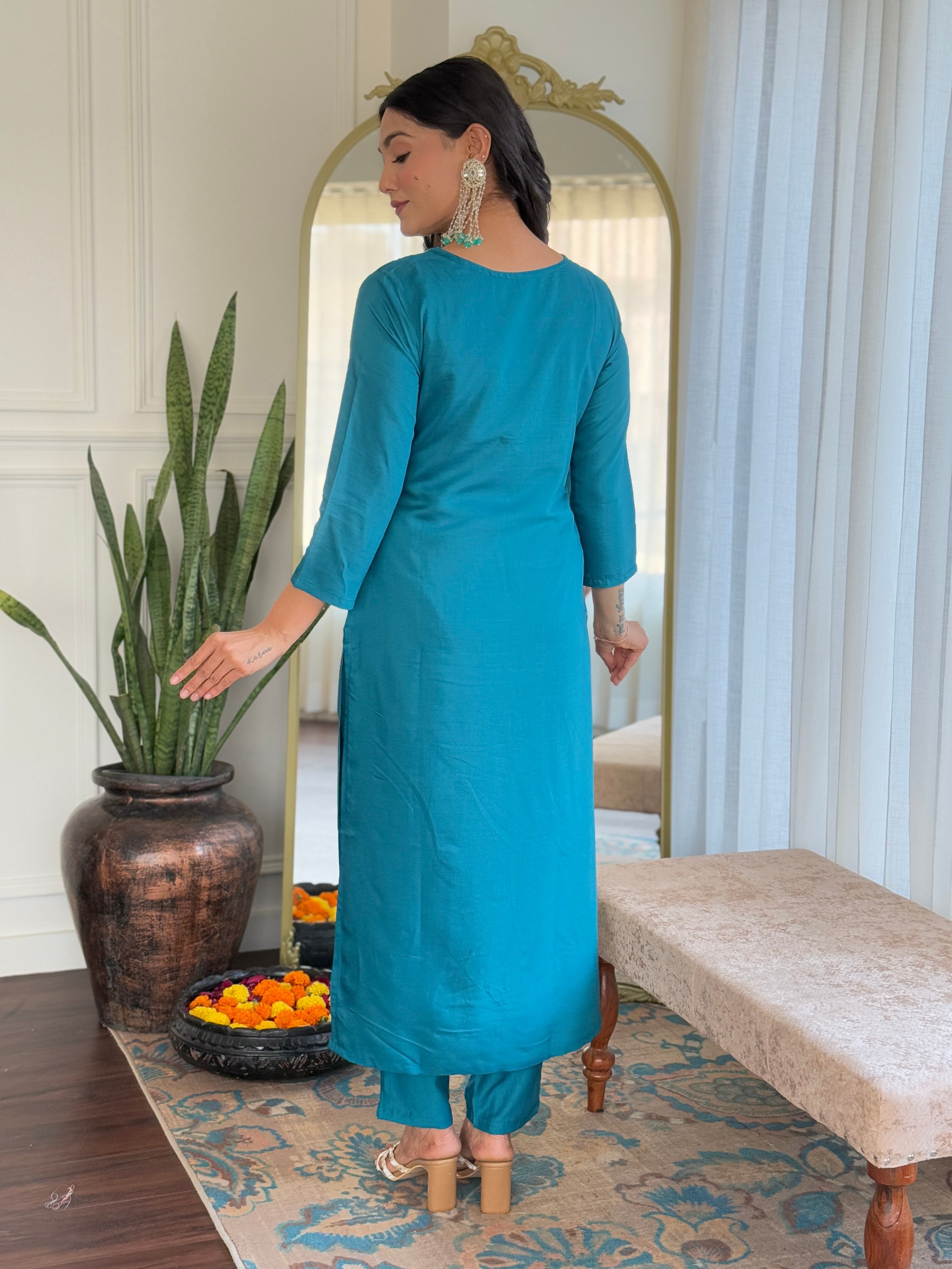 Step into elegance this Eid with this stunning Firozi salwar kameez