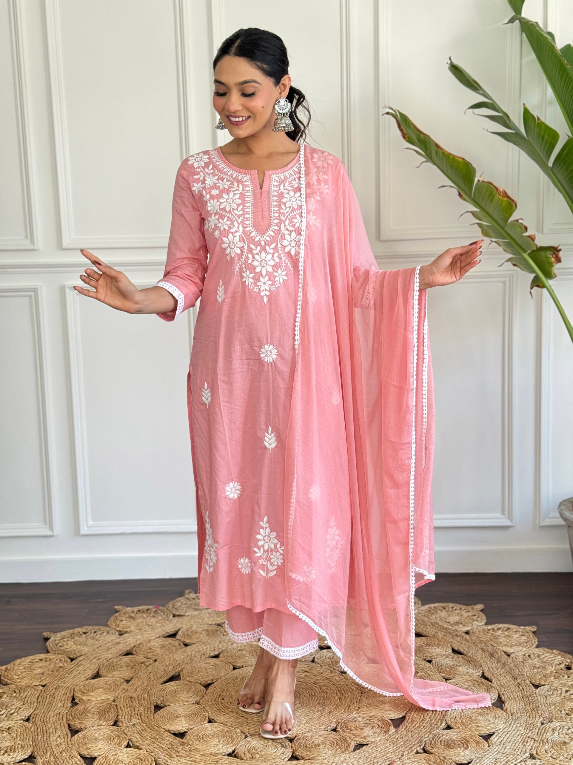 Add a touch of elegance to your Eid celebrations with this graceful pink salwar kameez