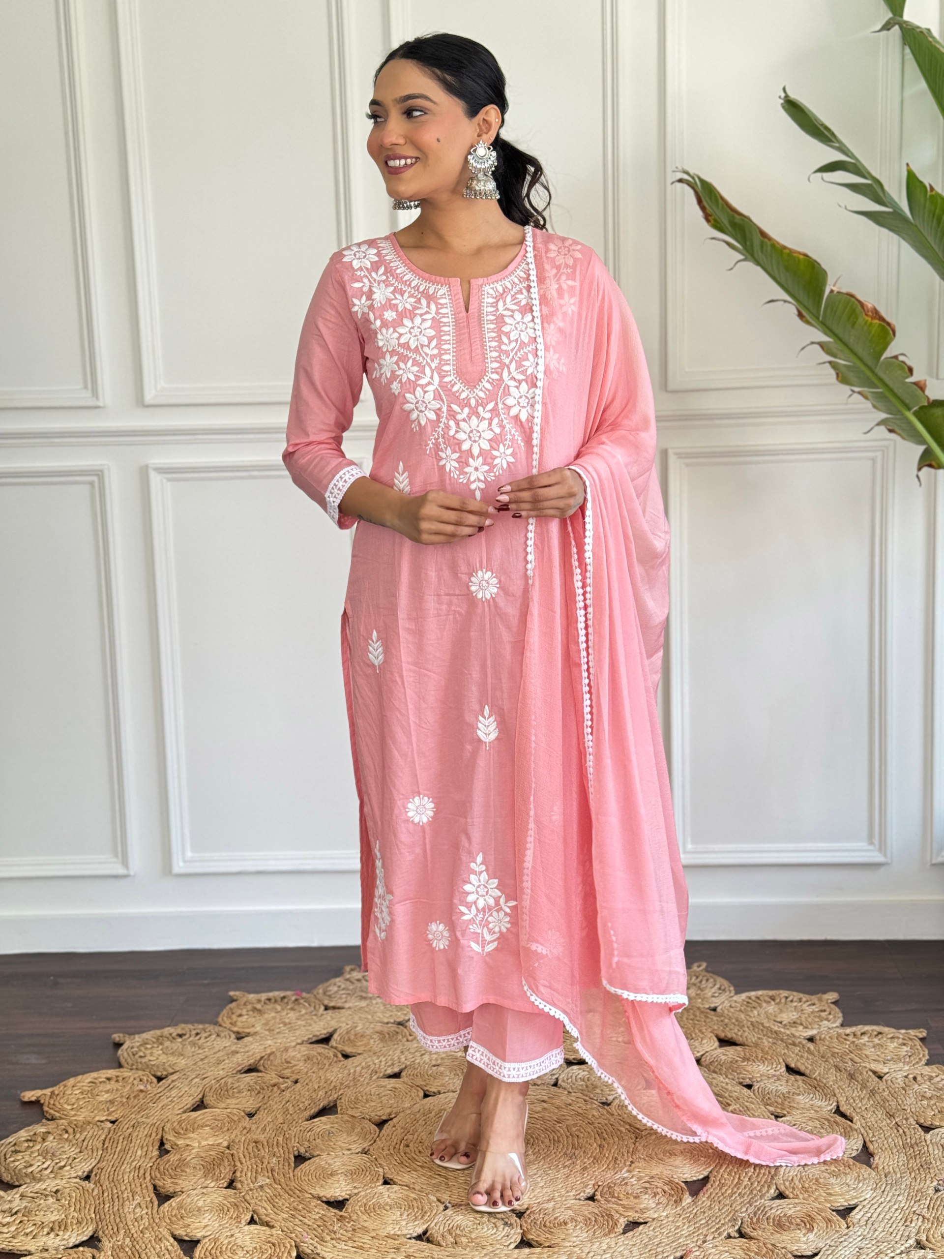 Add a touch of elegance to your Eid celebrations with this graceful pink salwar kameez