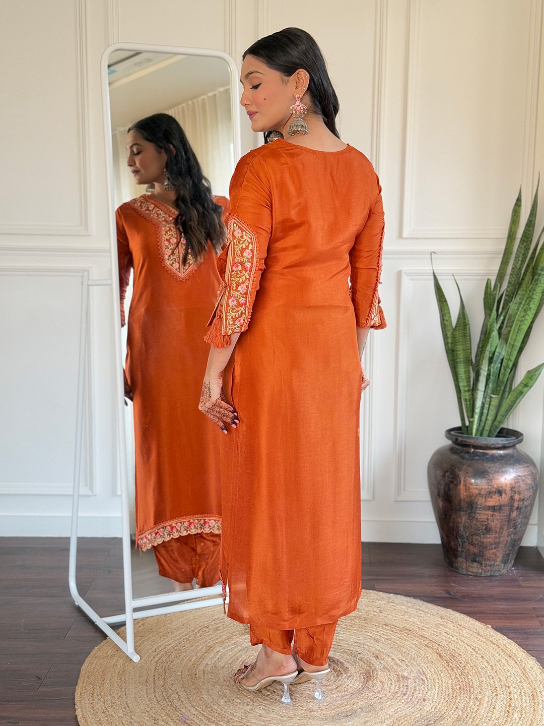 Brighten up your Eid celebrations with this stunning orange salwar kameez