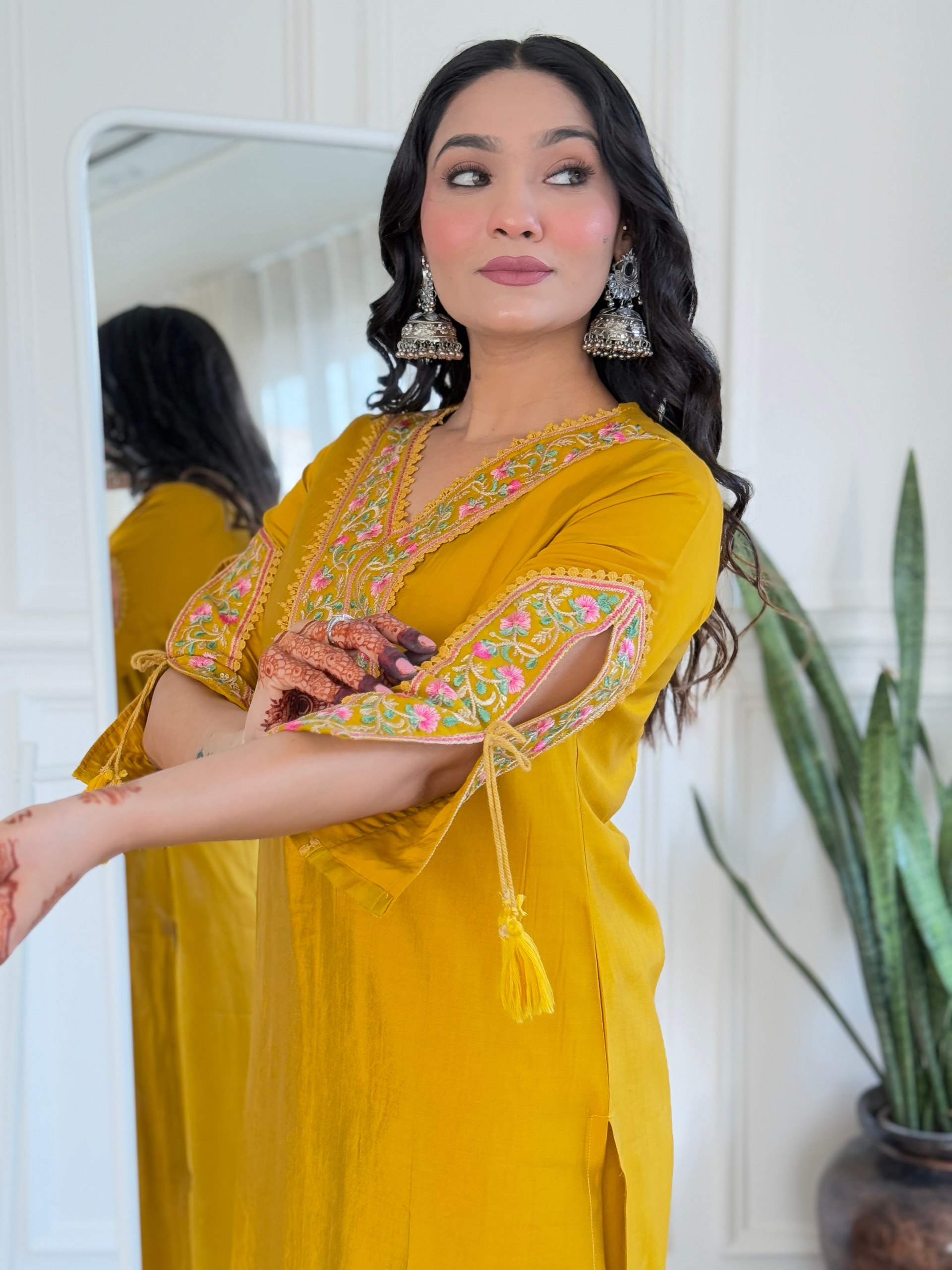 Step into elegance this Eid with this striking mustard yellow salwar kameez