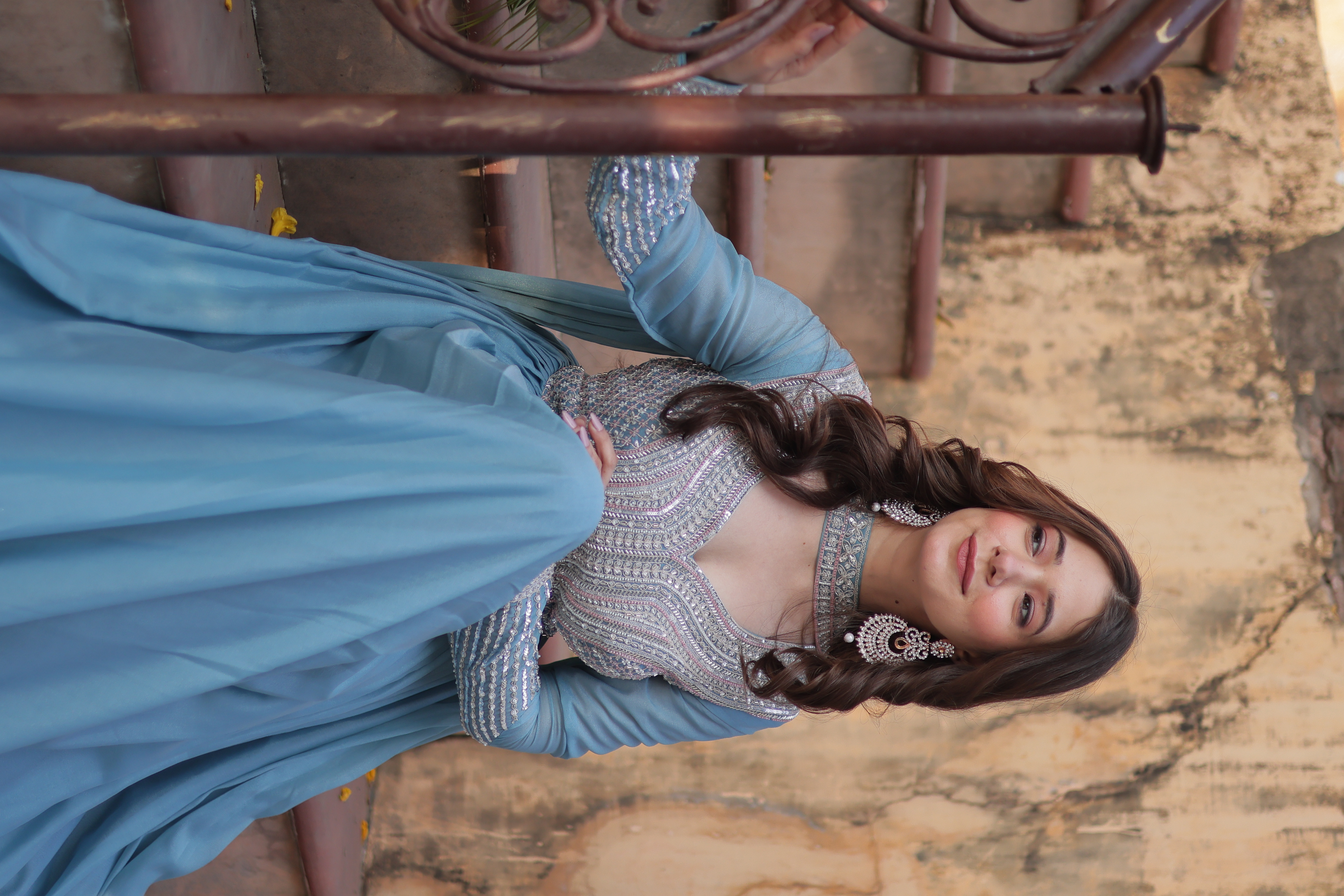 Radiate effortless charm in this sky blue cotton gown