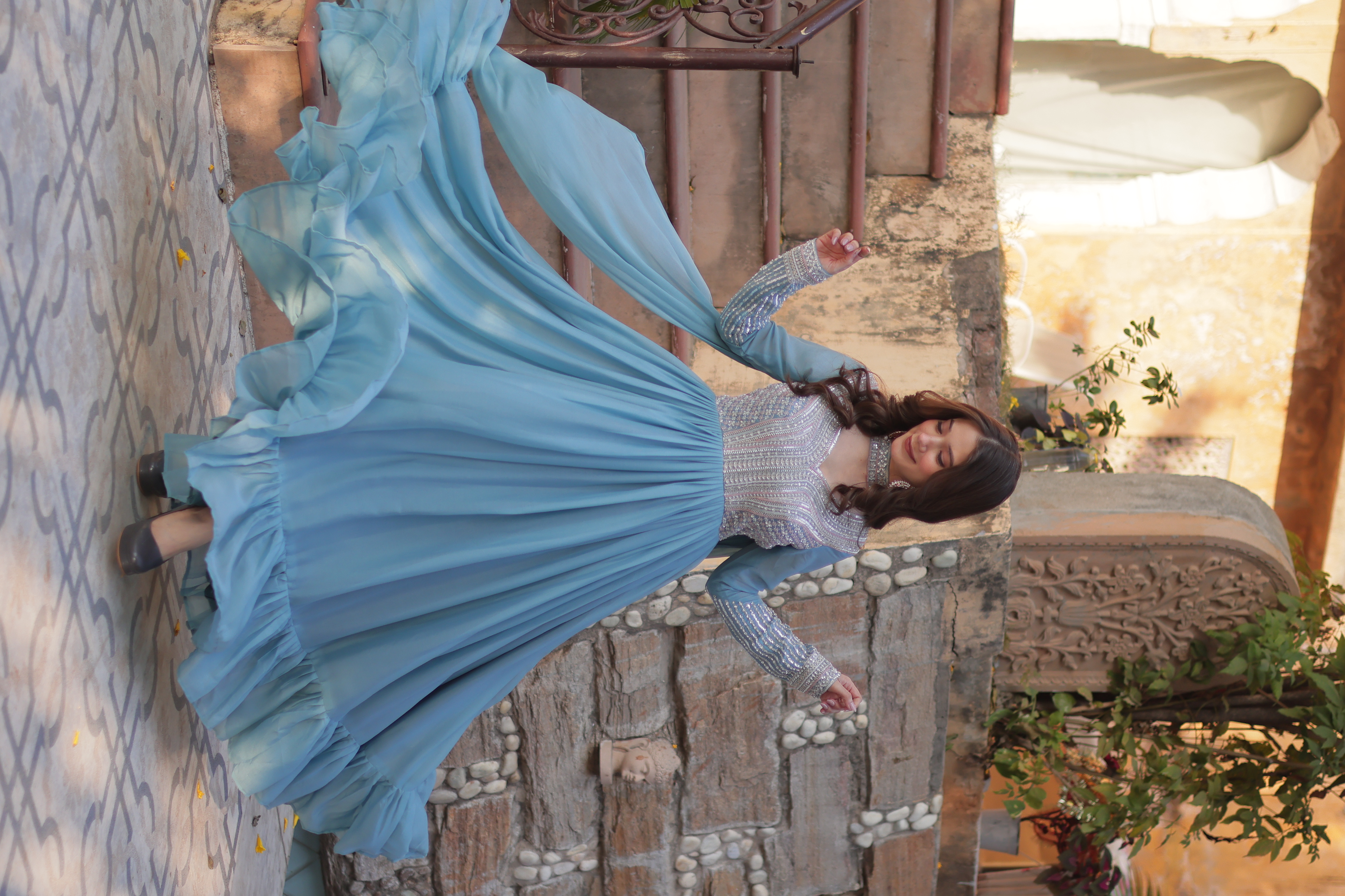 Radiate effortless charm in this sky blue cotton gown