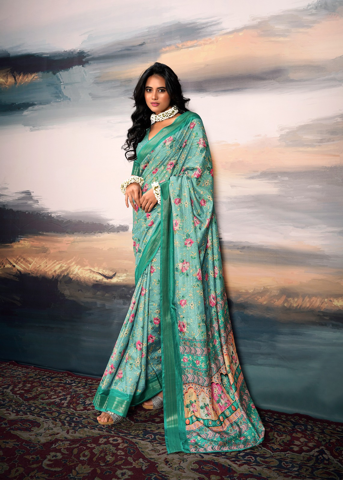 Drape yourself in elegance with this serene sea green cotton silk saree