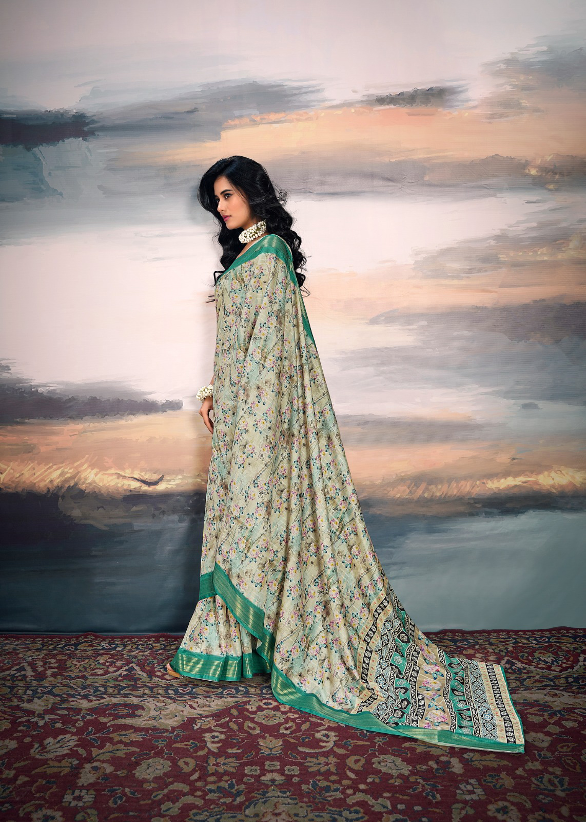 Embrace elegance with this stunning Rama-coloured cotton silk saree