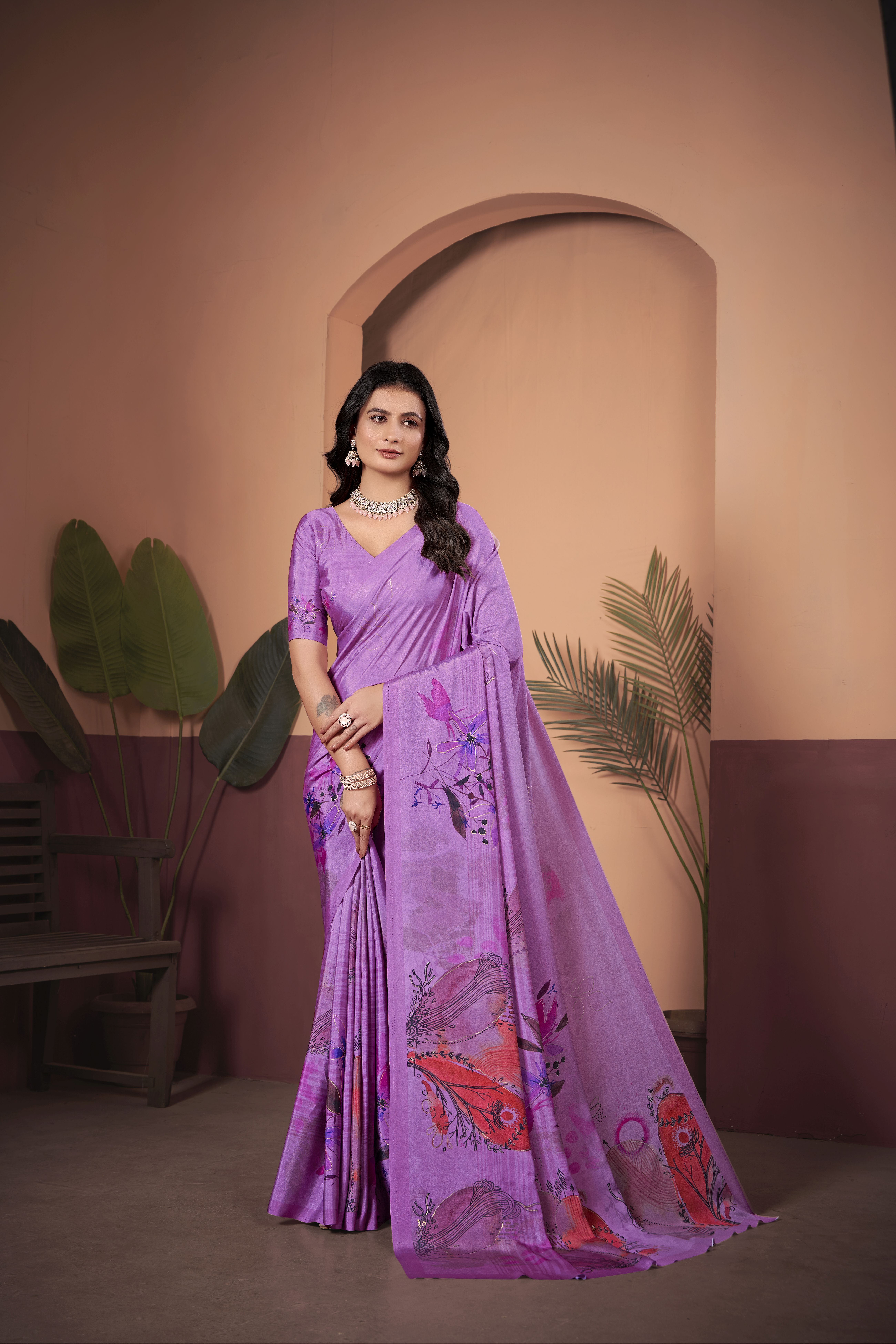 Indulge in sheer elegance with this luxurious purple soft crepe silk saree