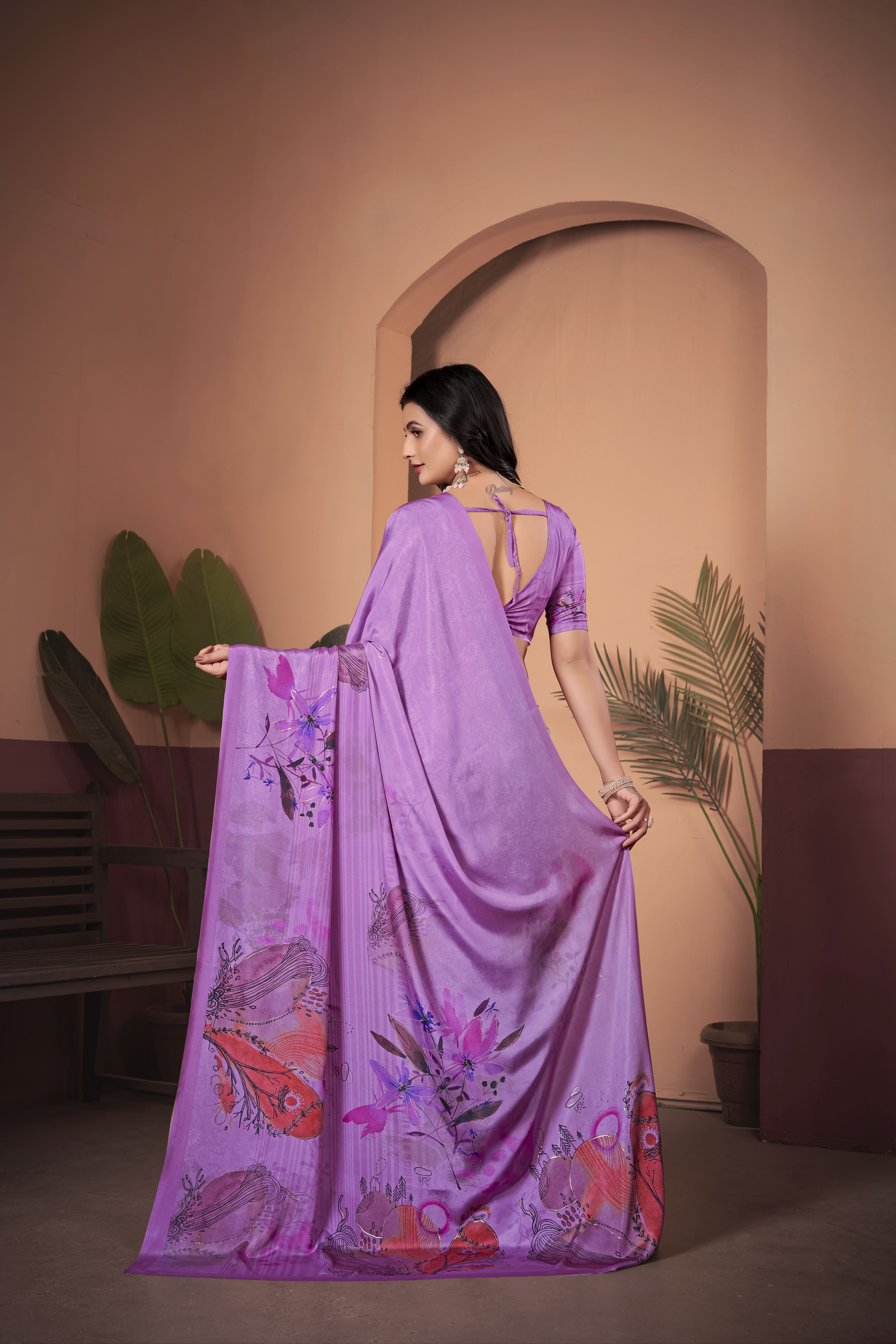 Indulge in sheer elegance with this luxurious purple soft crepe silk saree
