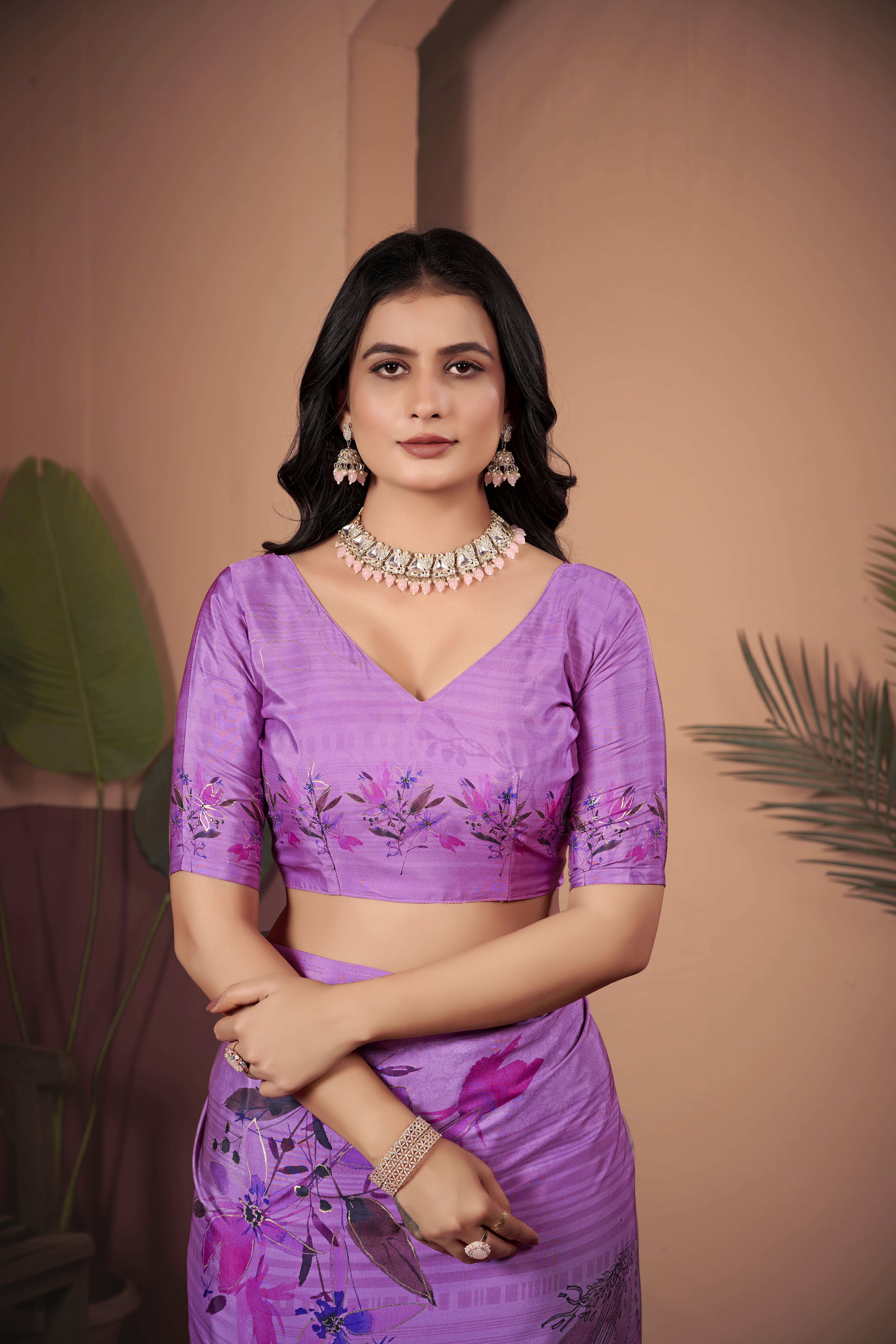 Indulge in sheer elegance with this luxurious purple soft crepe silk saree