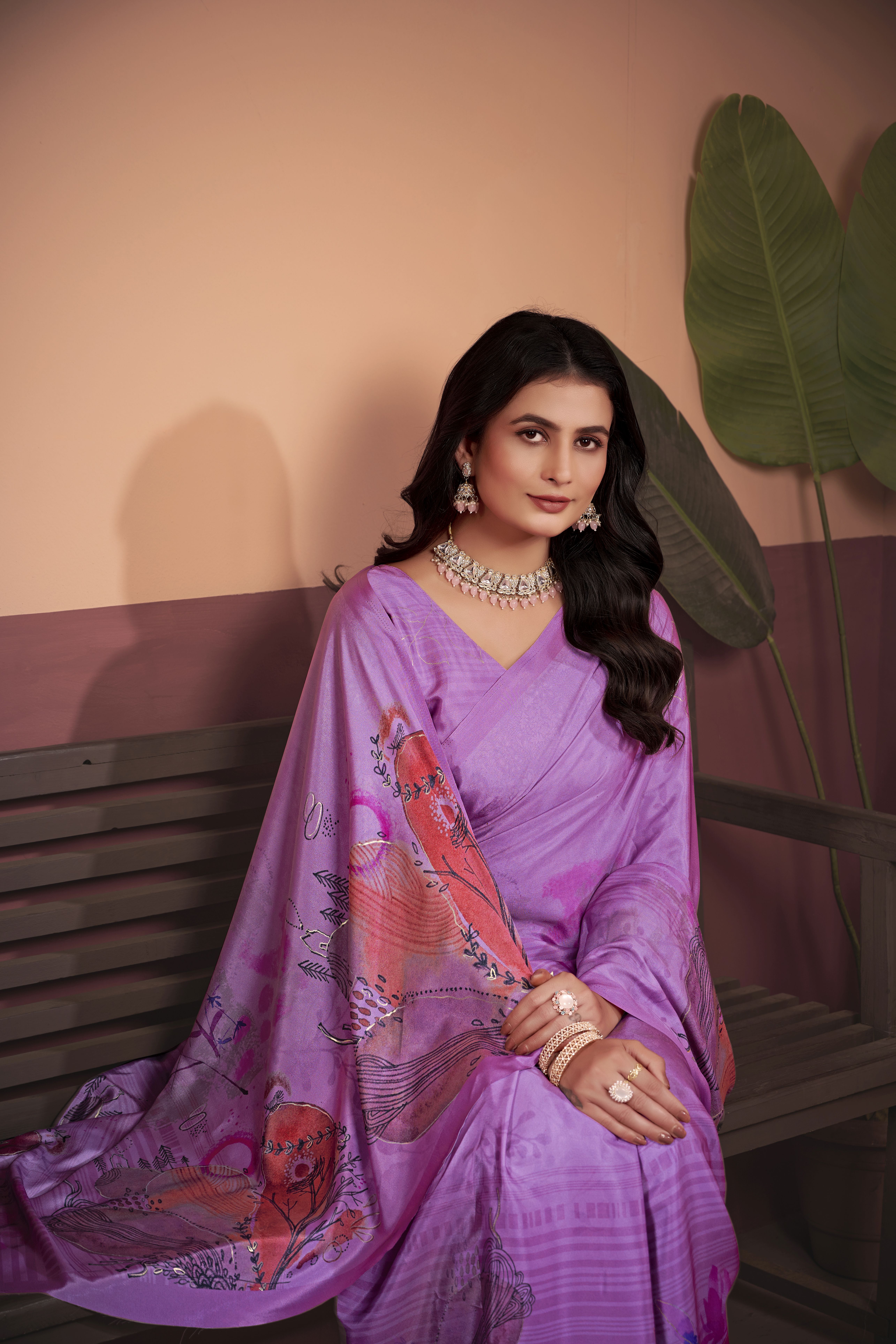 Indulge in sheer elegance with this luxurious purple soft crepe silk saree