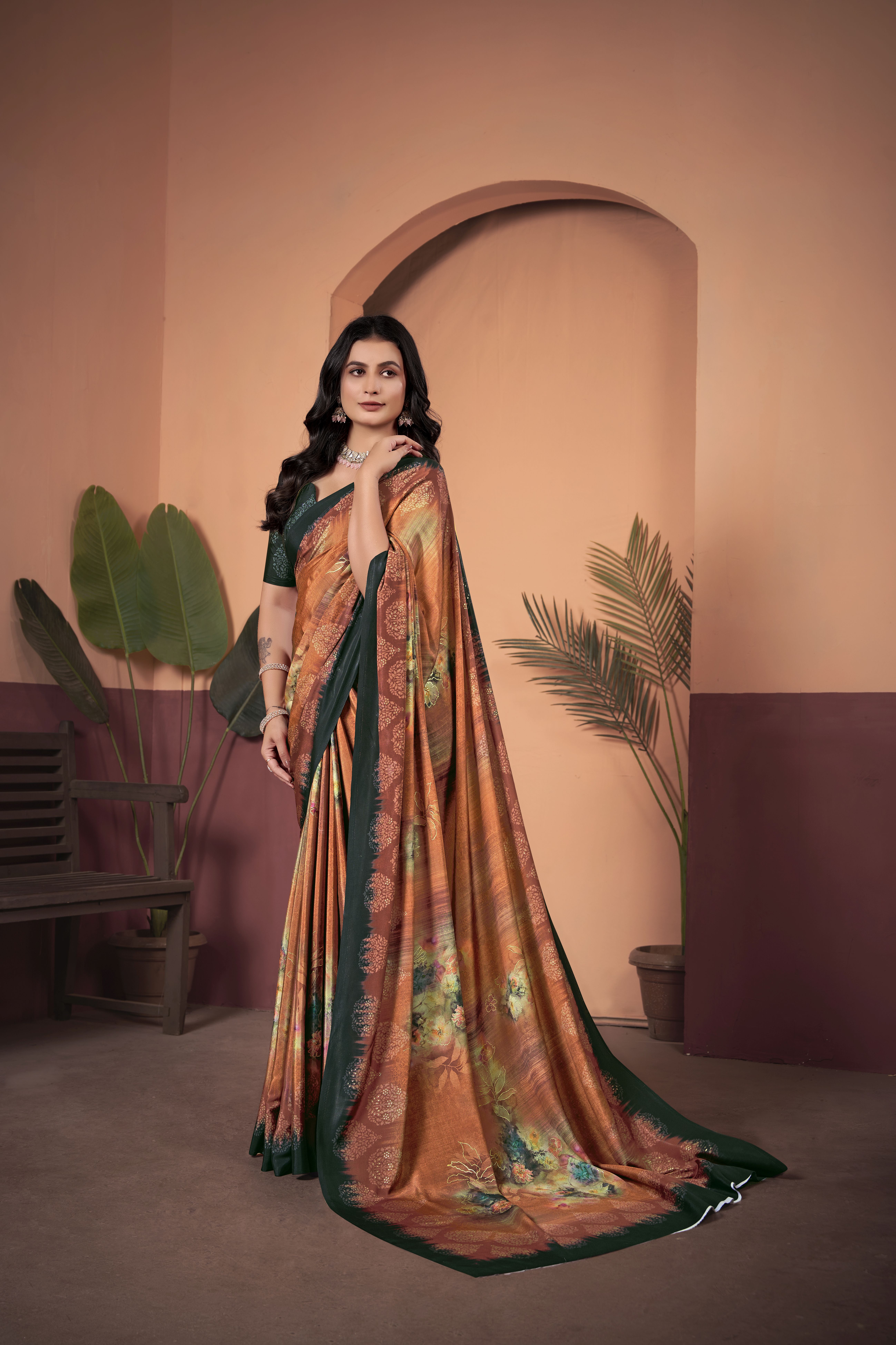 Vibrant Orange Crepe Silk Saree with Contrasting Green Blouse