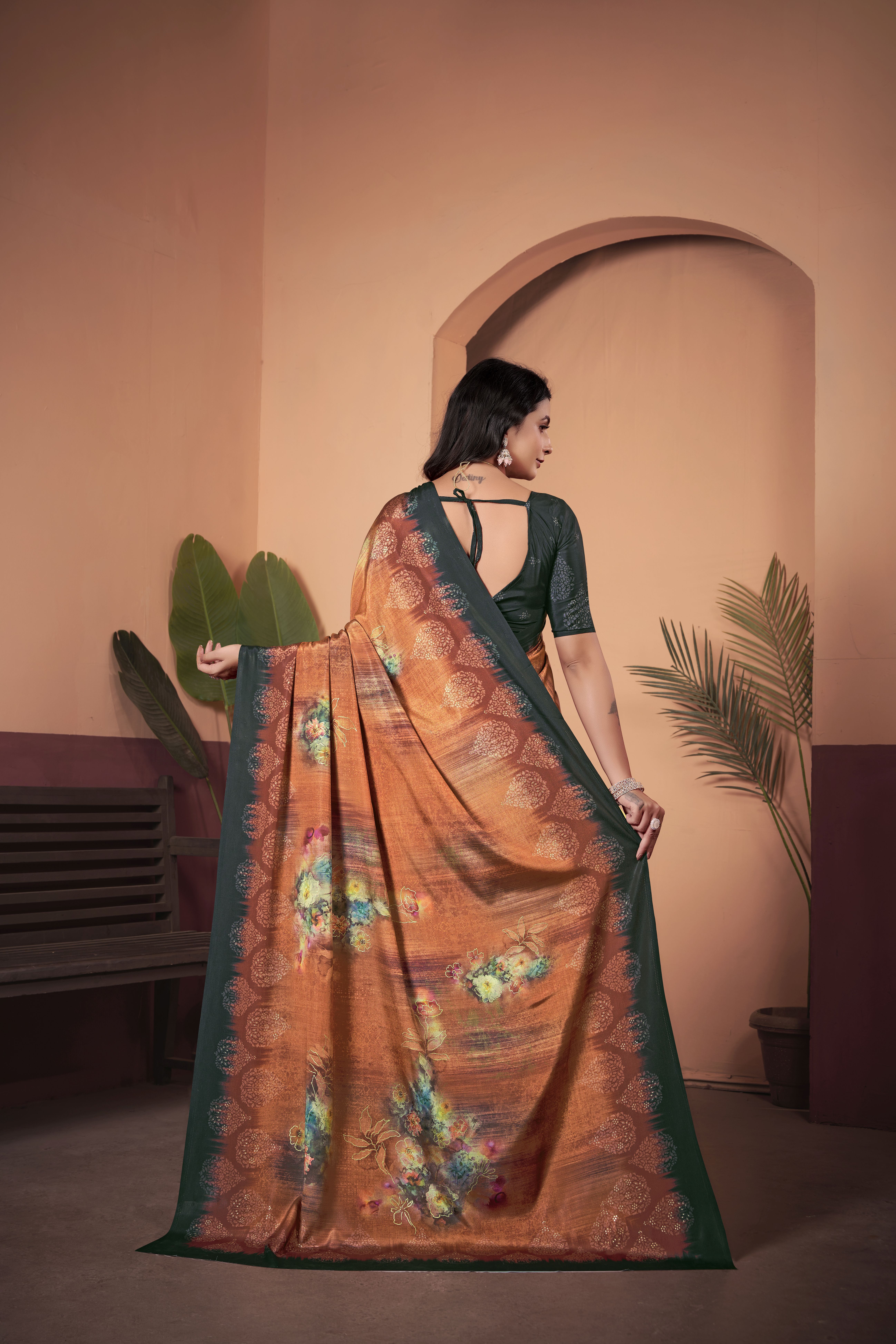 Vibrant Orange Crepe Silk Saree with Contrasting Green Blouse