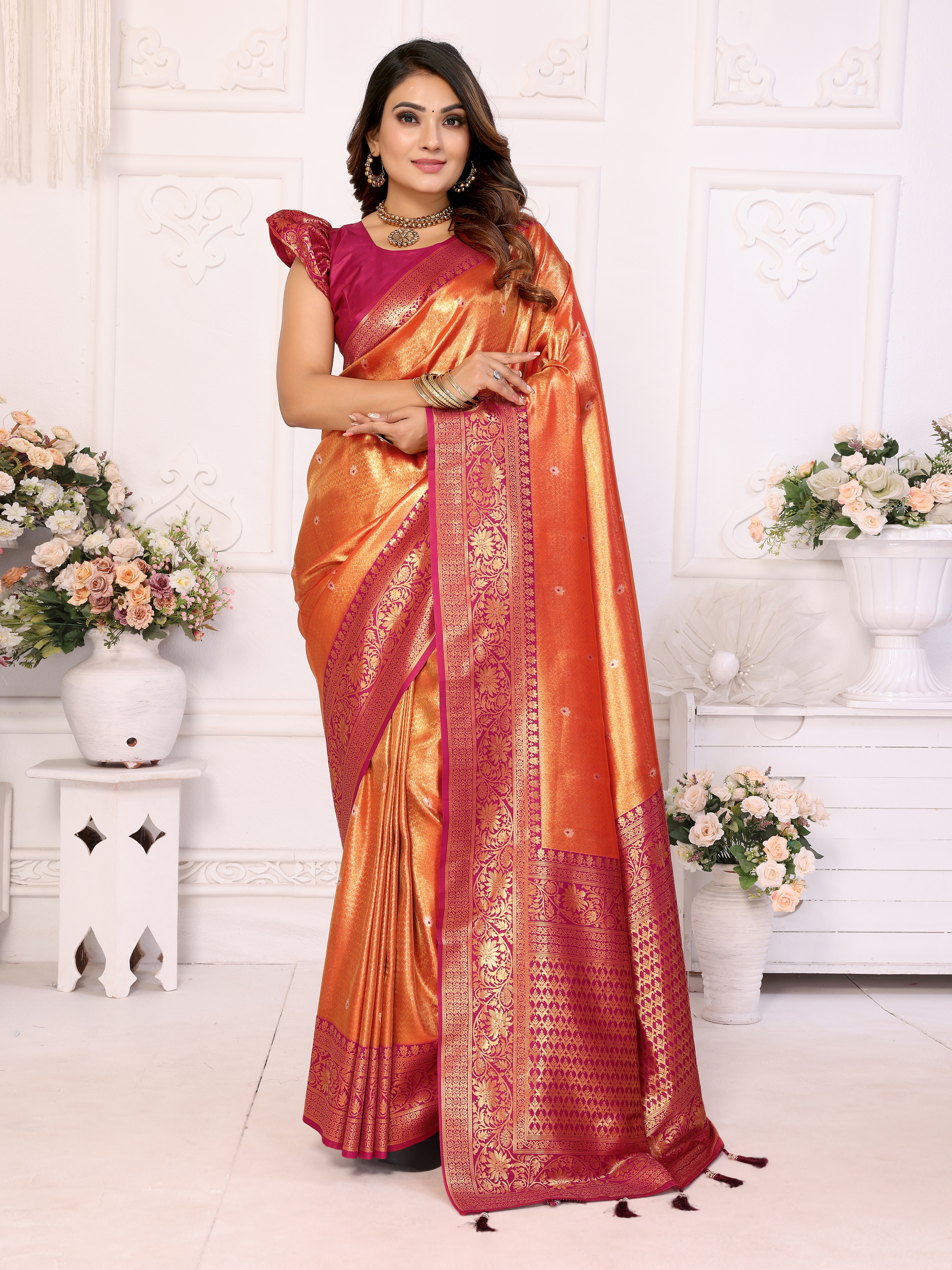 Exquisite Orange Banarasi Tissue Saree with Heavy Zari & Maroon Blouse