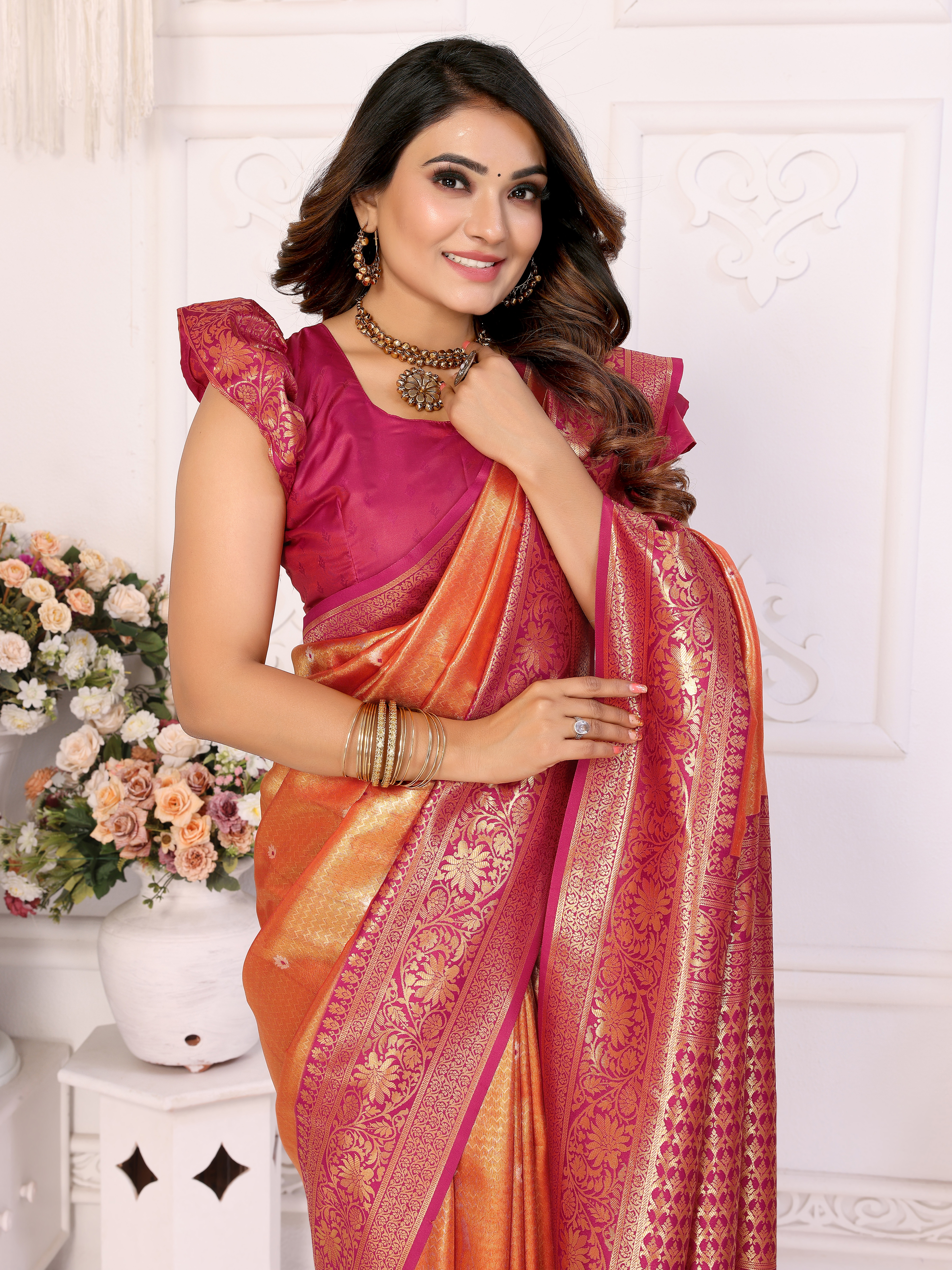 Exquisite Orange Banarasi Tissue Saree with Heavy Zari & Maroon Blouse
