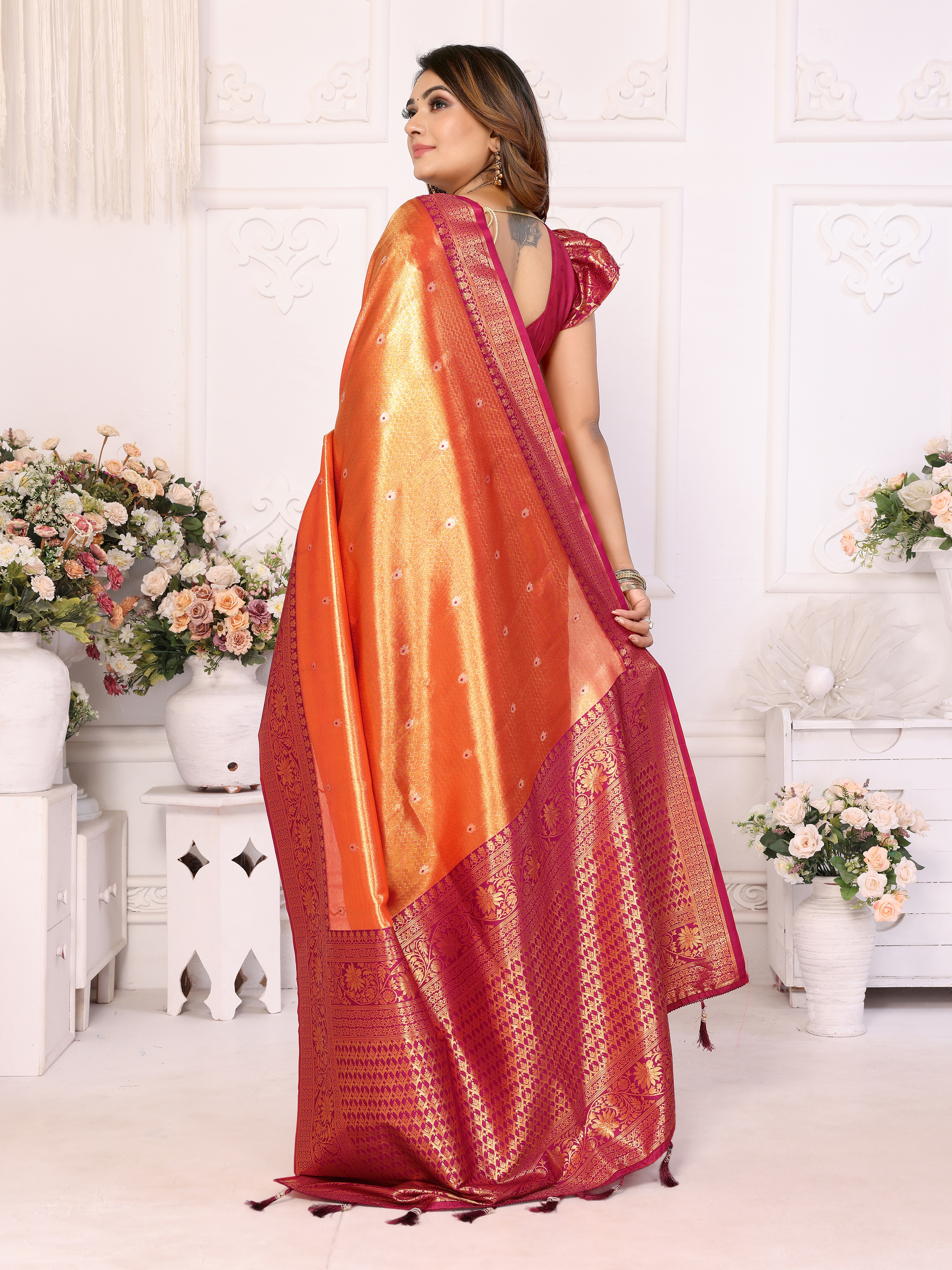 Exquisite Orange Banarasi Tissue Saree with Heavy Zari & Maroon Blouse