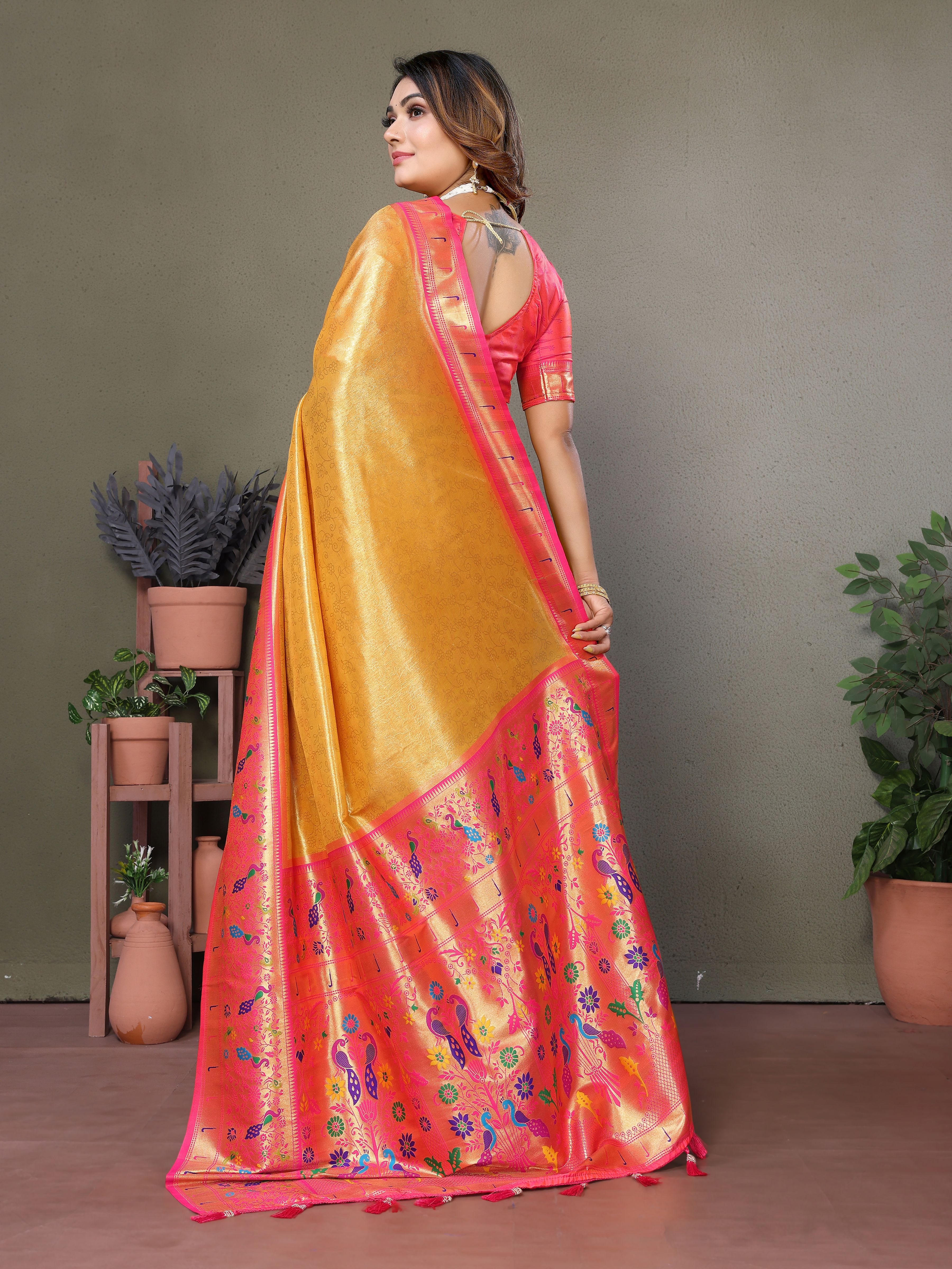 Drape yourself in elegance with this mustard yellow Paithani silk saree