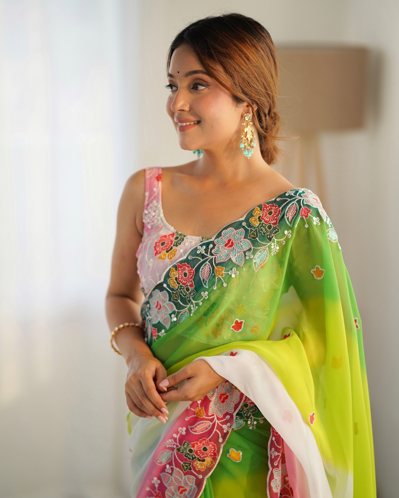 Step into elegance with this stunning green saree
