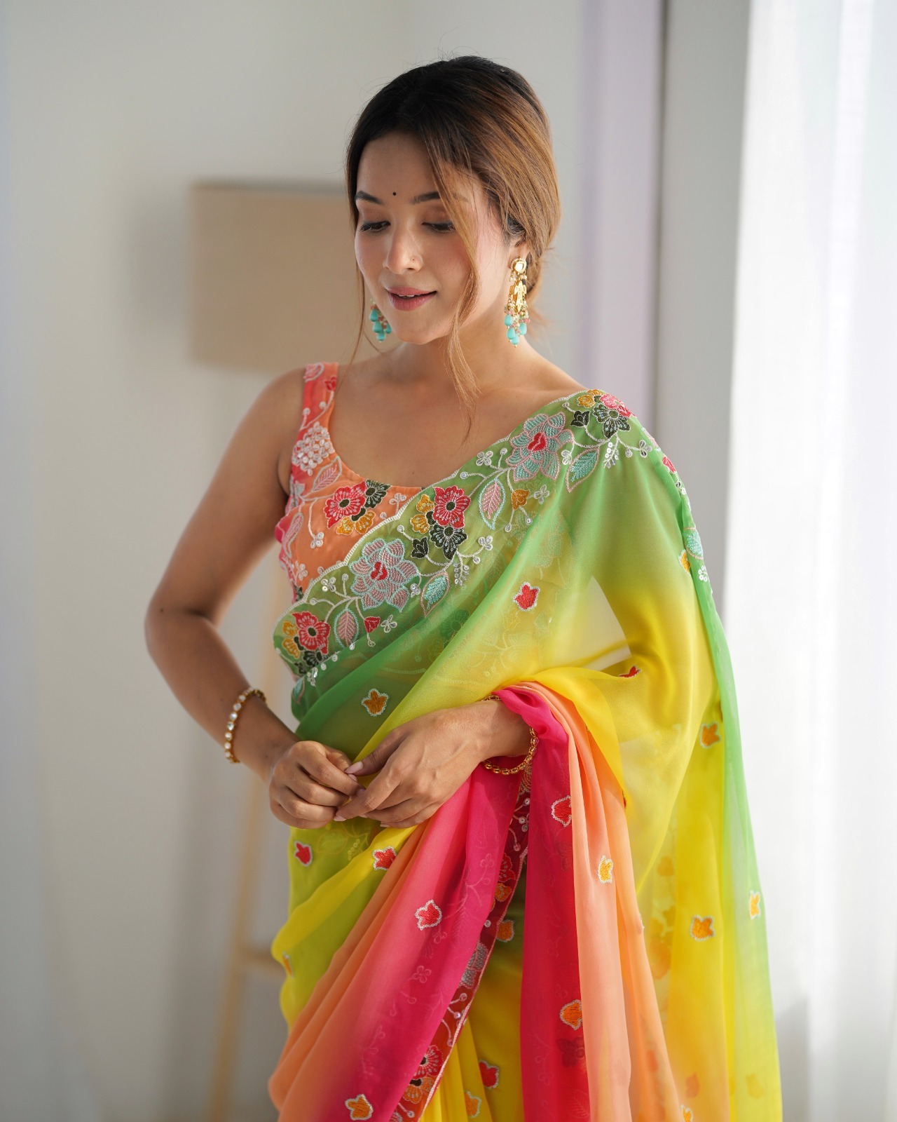 Radiant Yellow Georgette Saree with Elegant Peach Blouse
