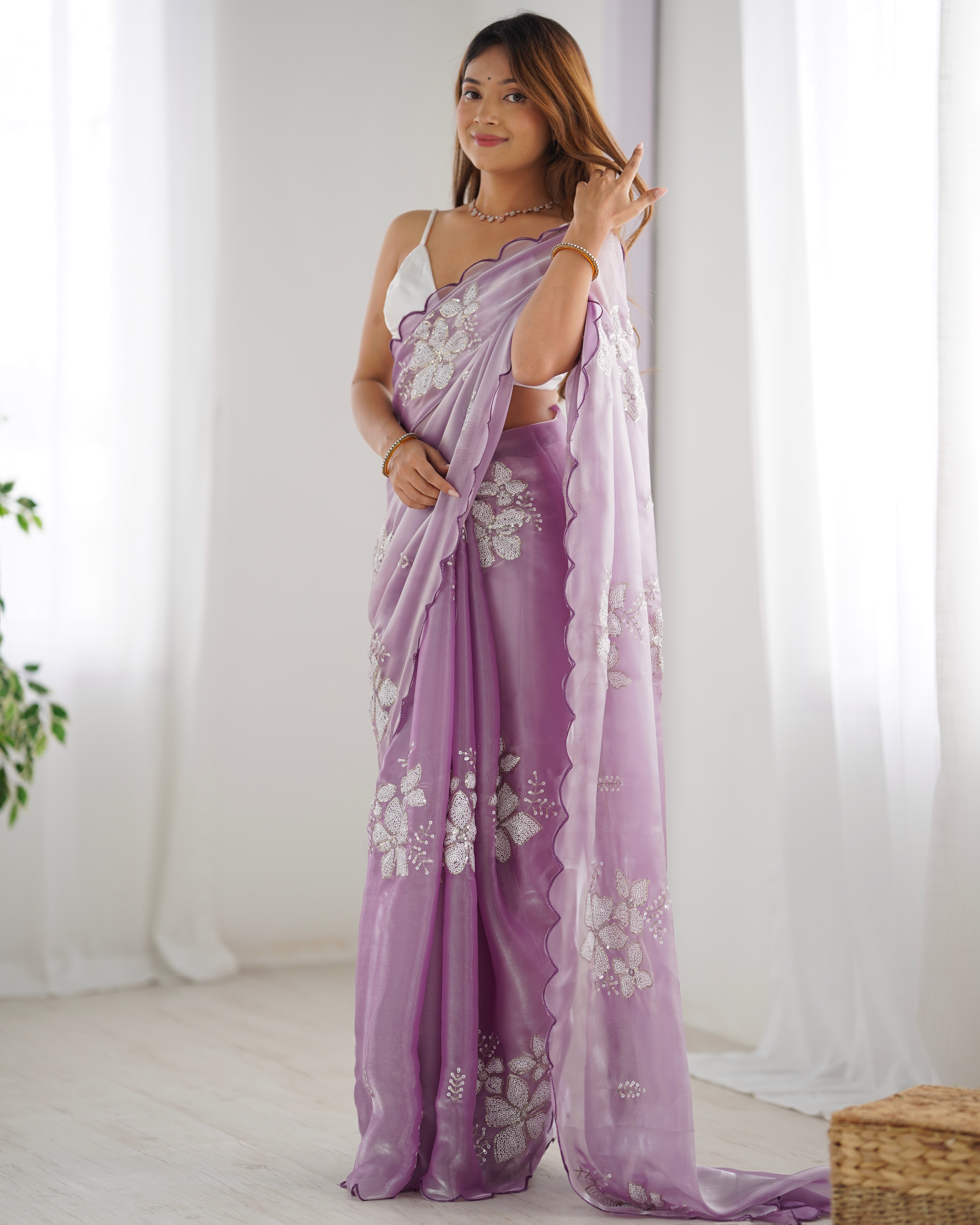Step into refined elegance with this lavender saree