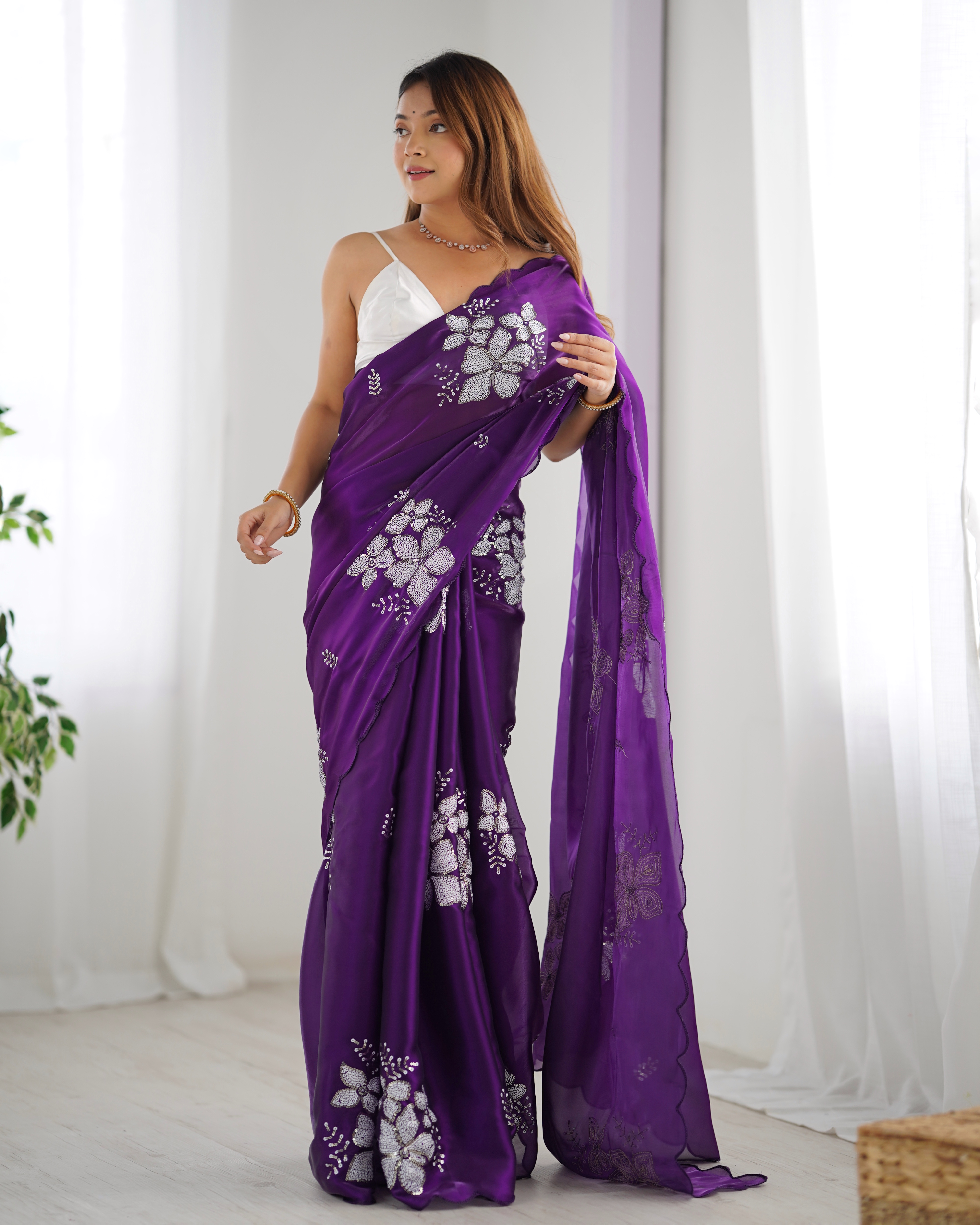 Step into royal elegance with this gorgeous purple saree