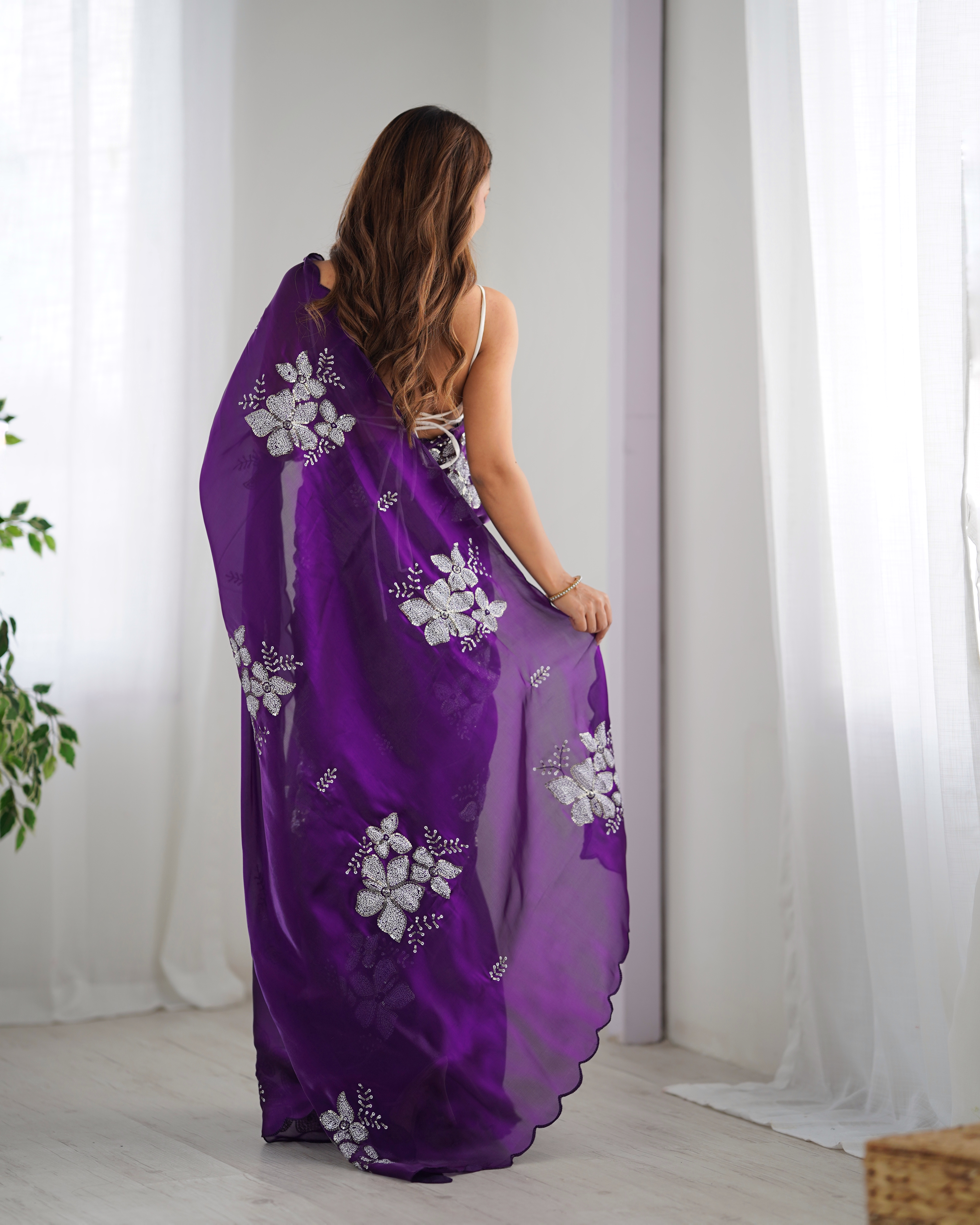 Step into royal elegance with this gorgeous purple saree