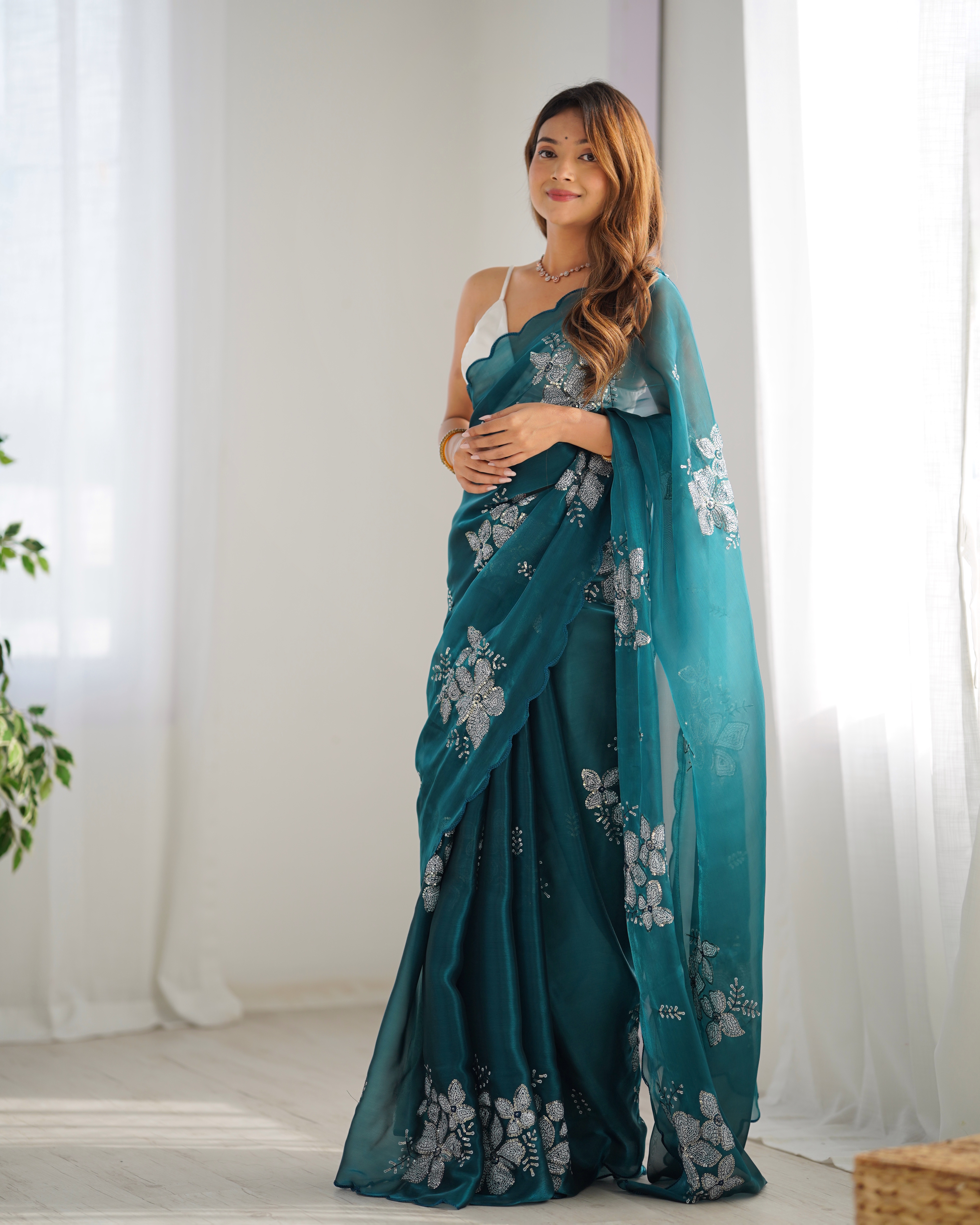 Drape yourself in sophistication and grace with this stunning blue  party wear designer saree