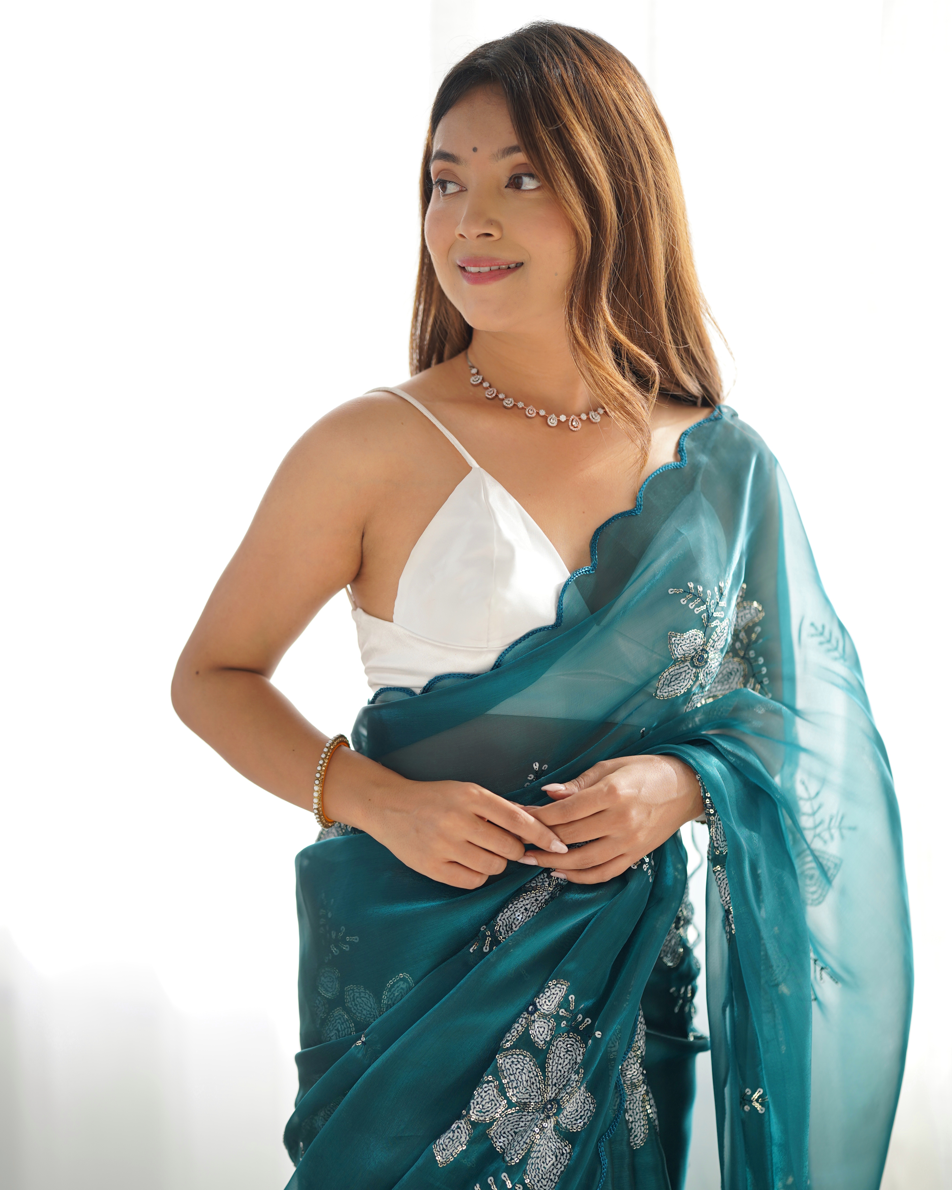 Drape yourself in sophistication and grace with this stunning blue  party wear designer saree