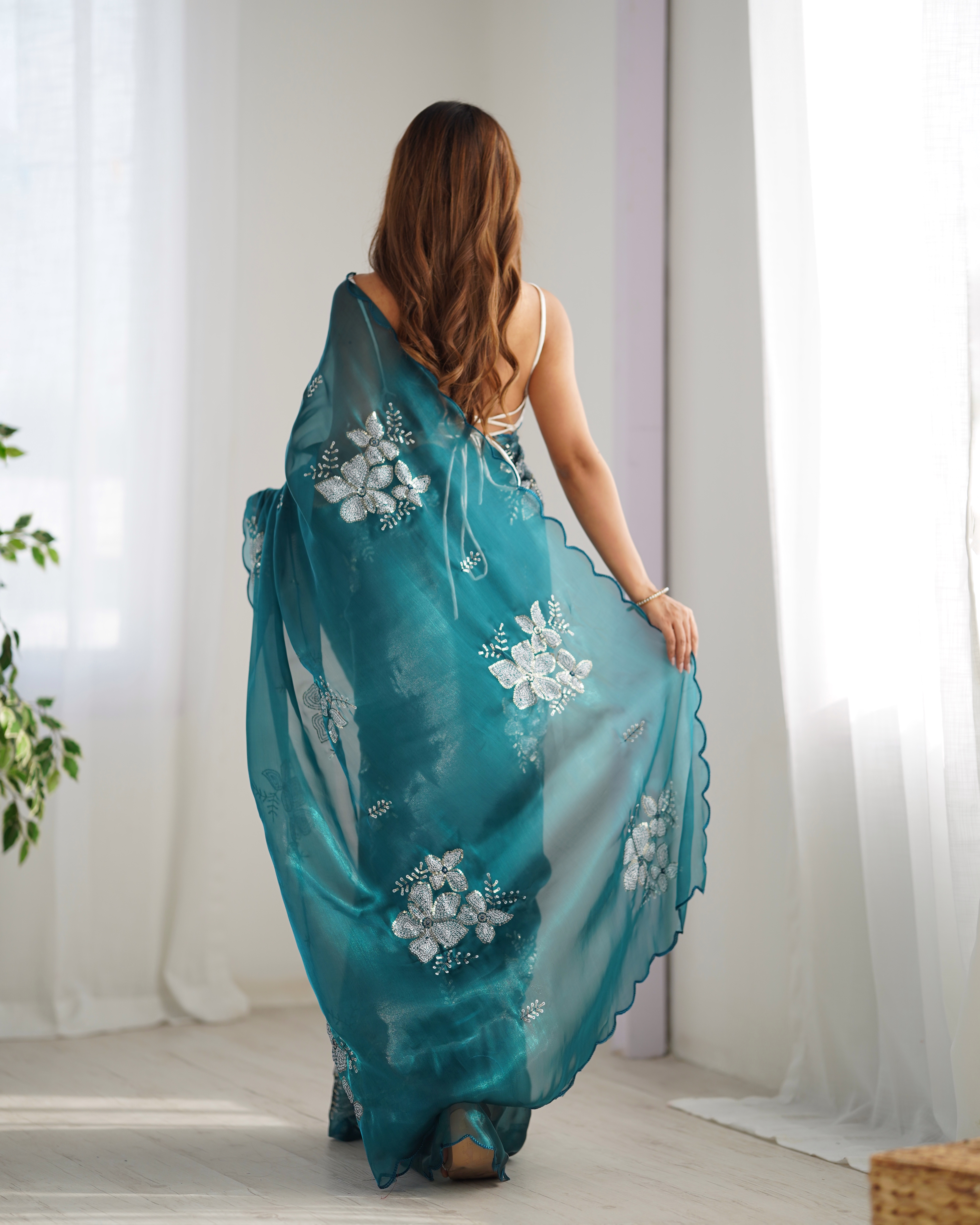 Drape yourself in sophistication and grace with this stunning blue  party wear designer saree
