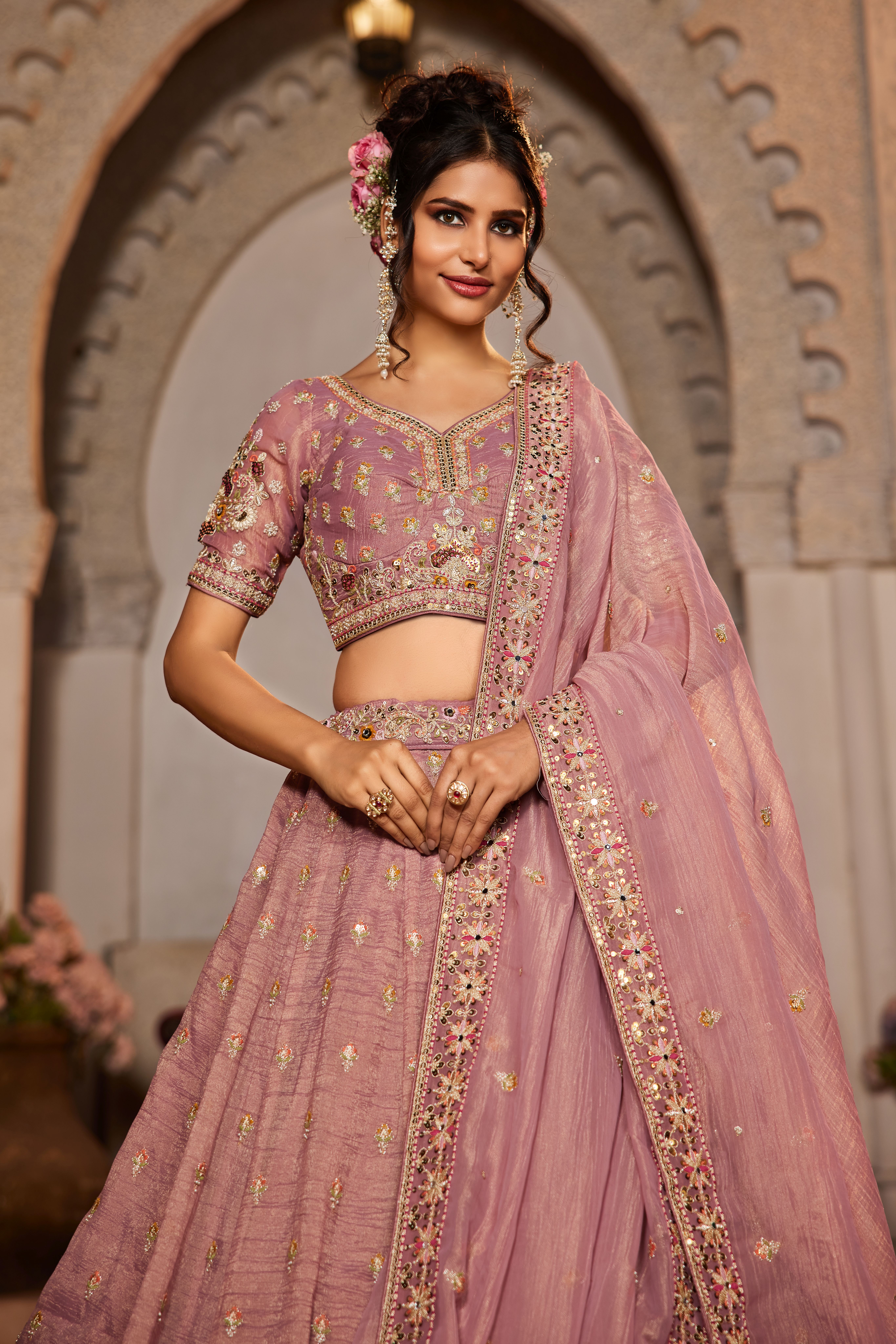 Steal the spotlight at any wedding celebration with this Attractive Partywear Pink Designer Lehenga and Choli