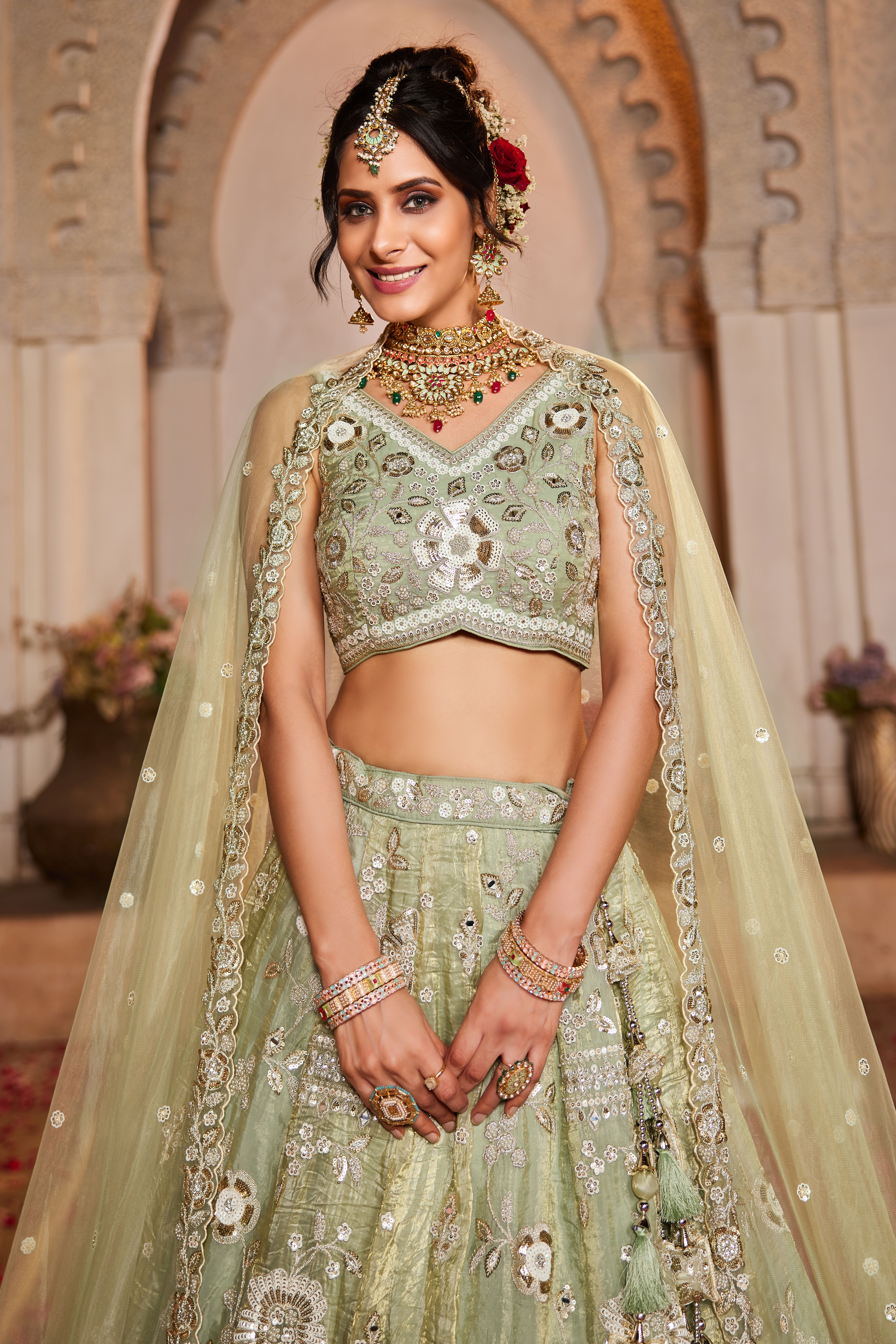 Enhance your wedding look with this Attractive Partywear Pistachio Green Designer Lehenga and Choli