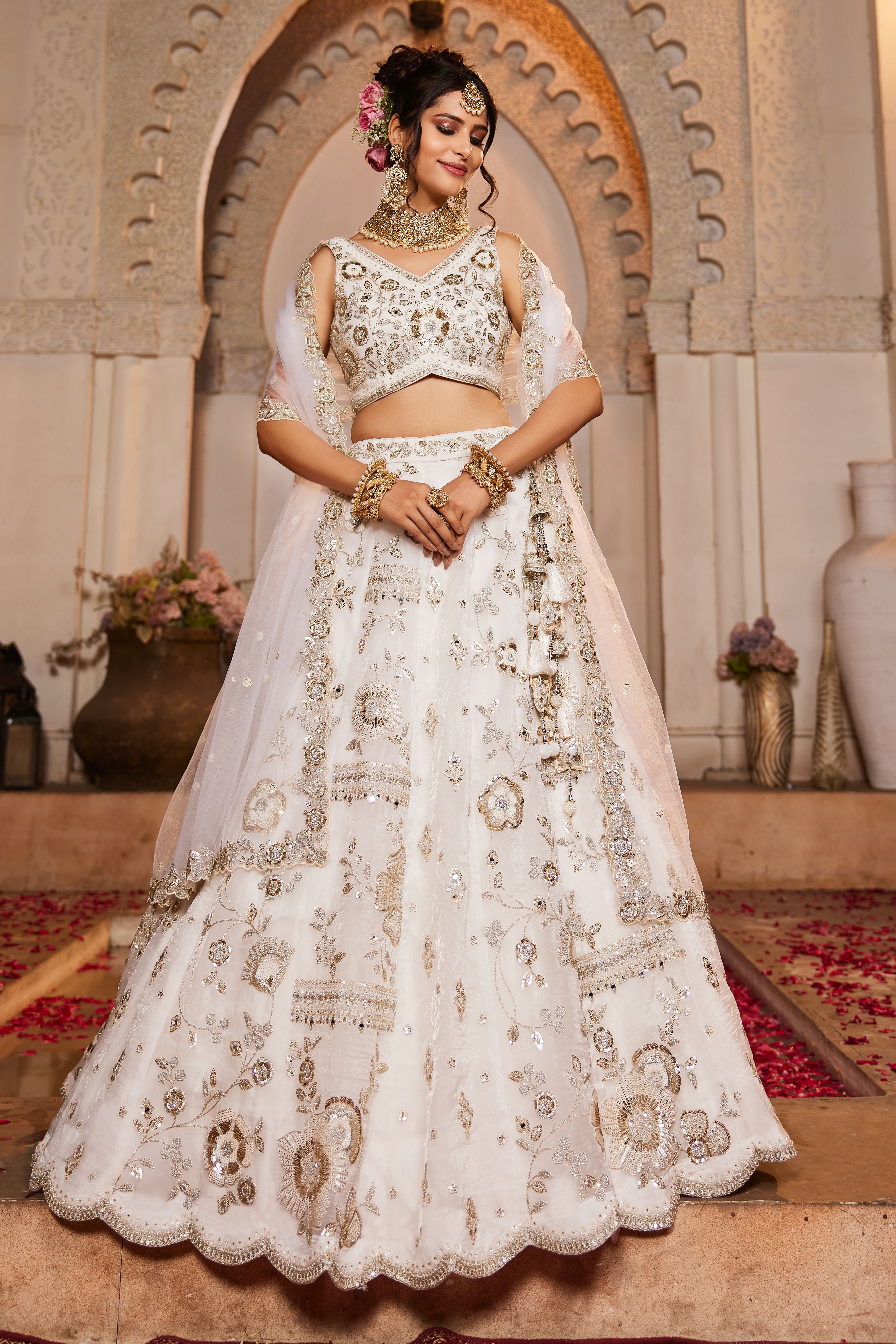 Drape yourself in elegance with this Attractive Partywear Off-White Designer Lehenga and Choli