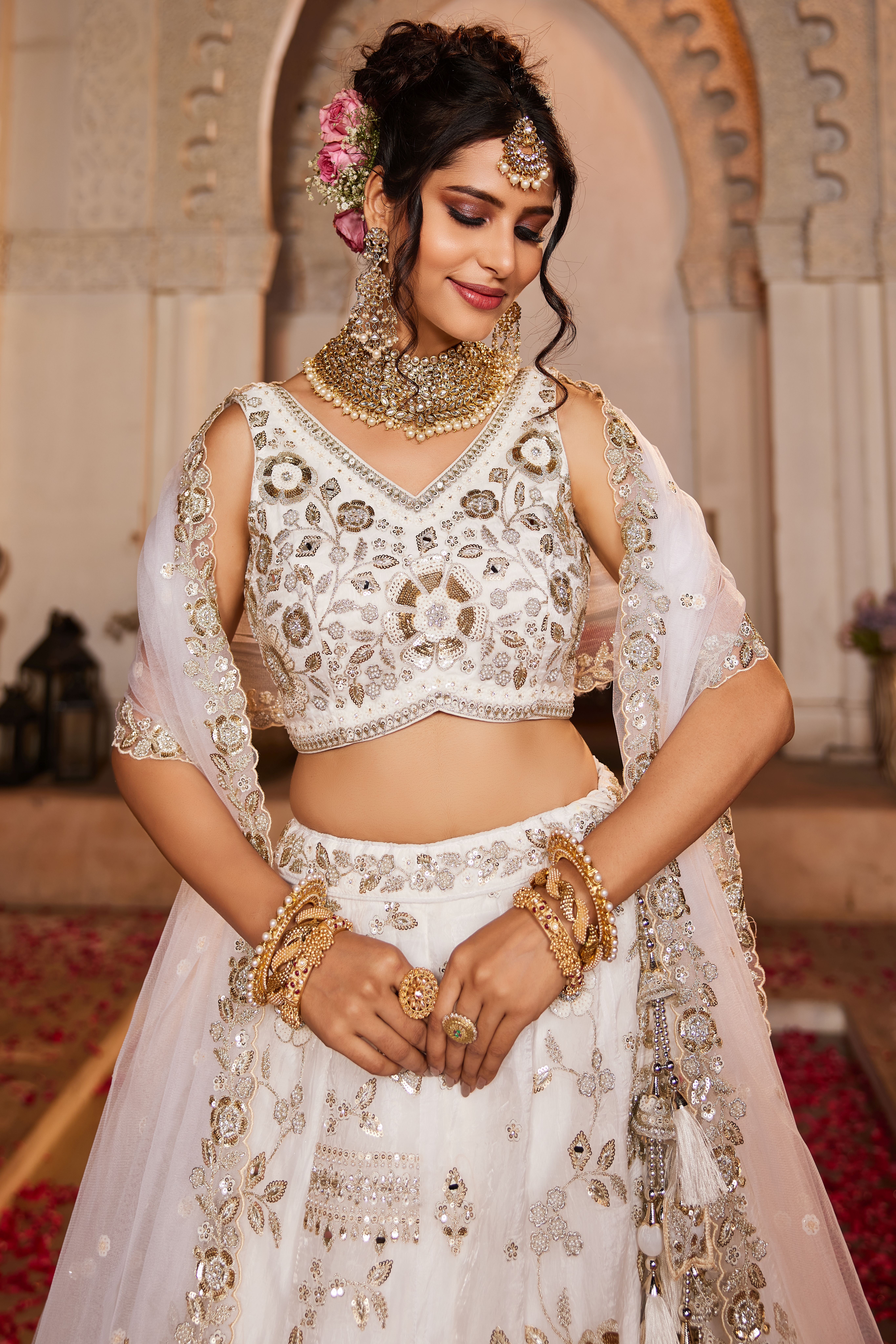 Drape yourself in elegance with this Attractive Partywear Off-White Designer Lehenga and Choli