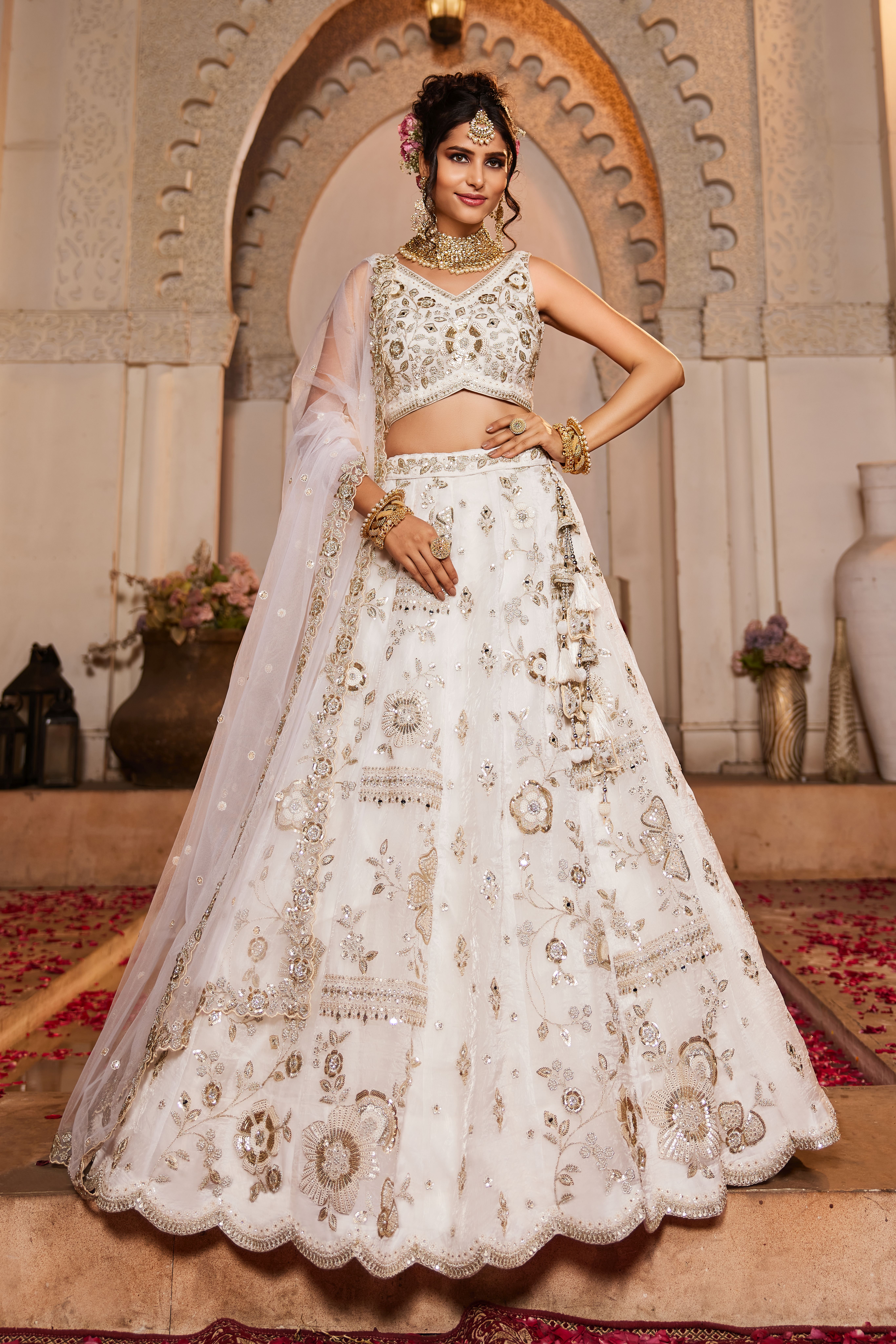 Drape yourself in elegance with this Attractive Partywear Off-White Designer Lehenga and Choli