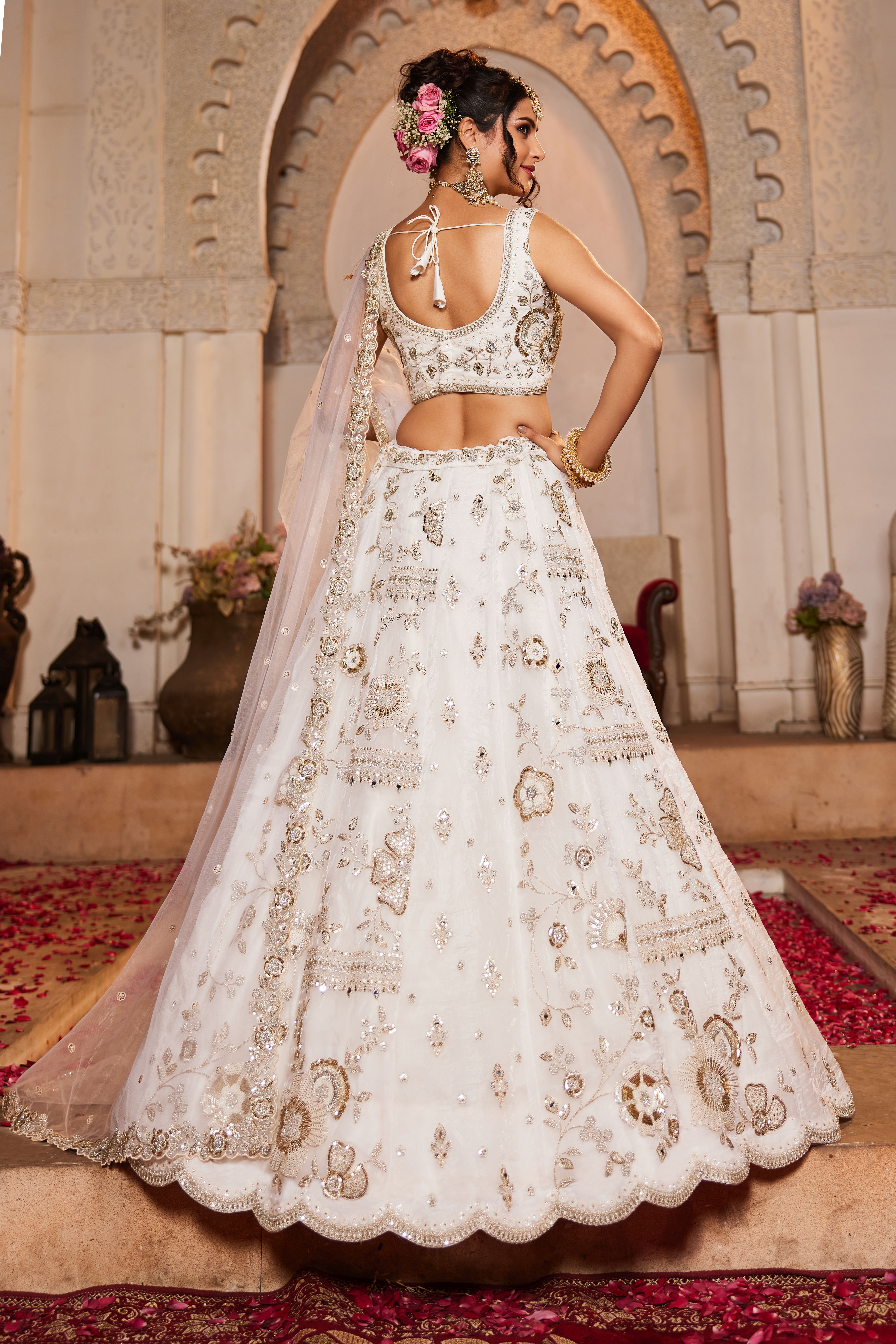 Drape yourself in elegance with this Attractive Partywear Off-White Designer Lehenga and Choli