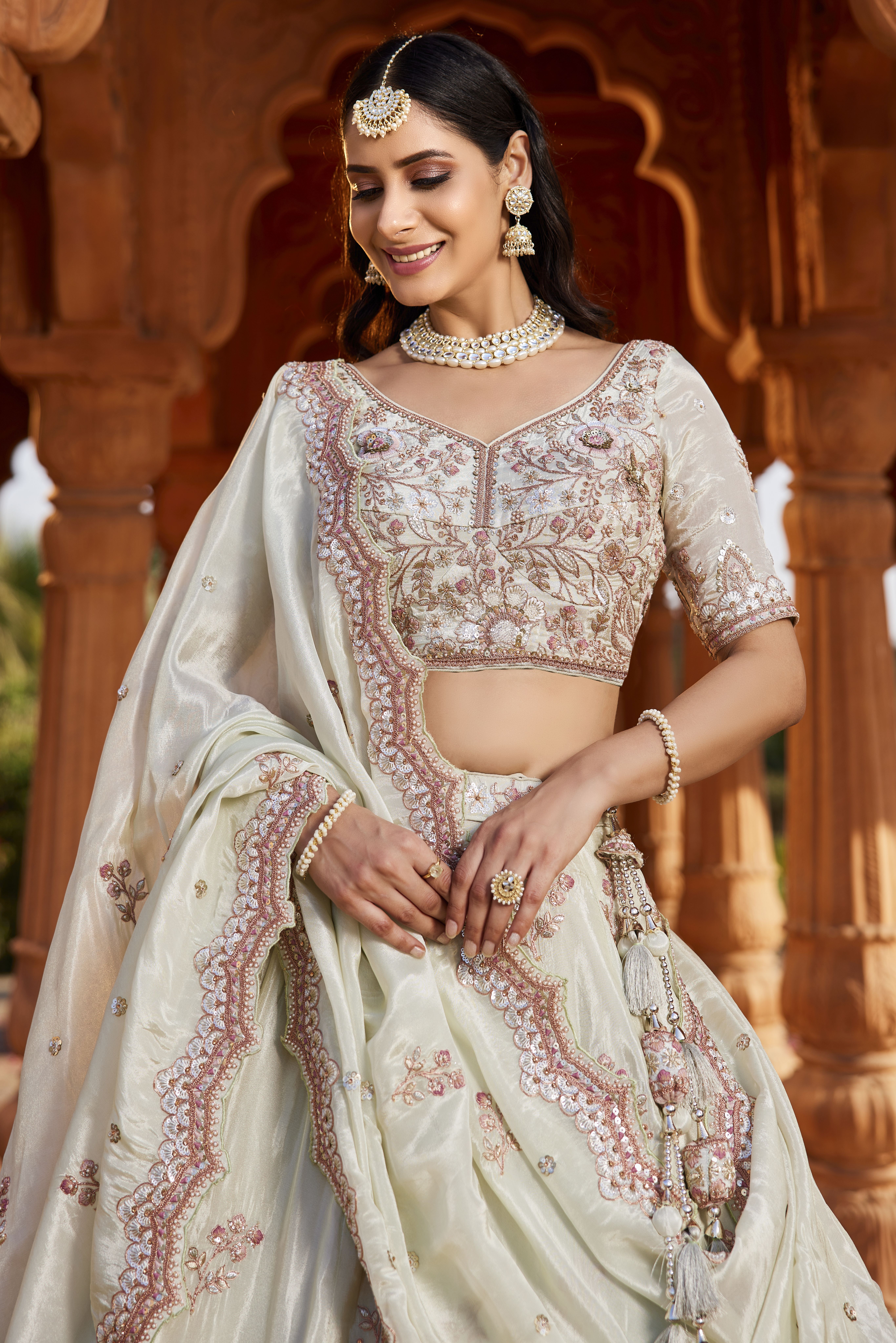 Step into elegance with this graceful Pista Green Designer Lehenga