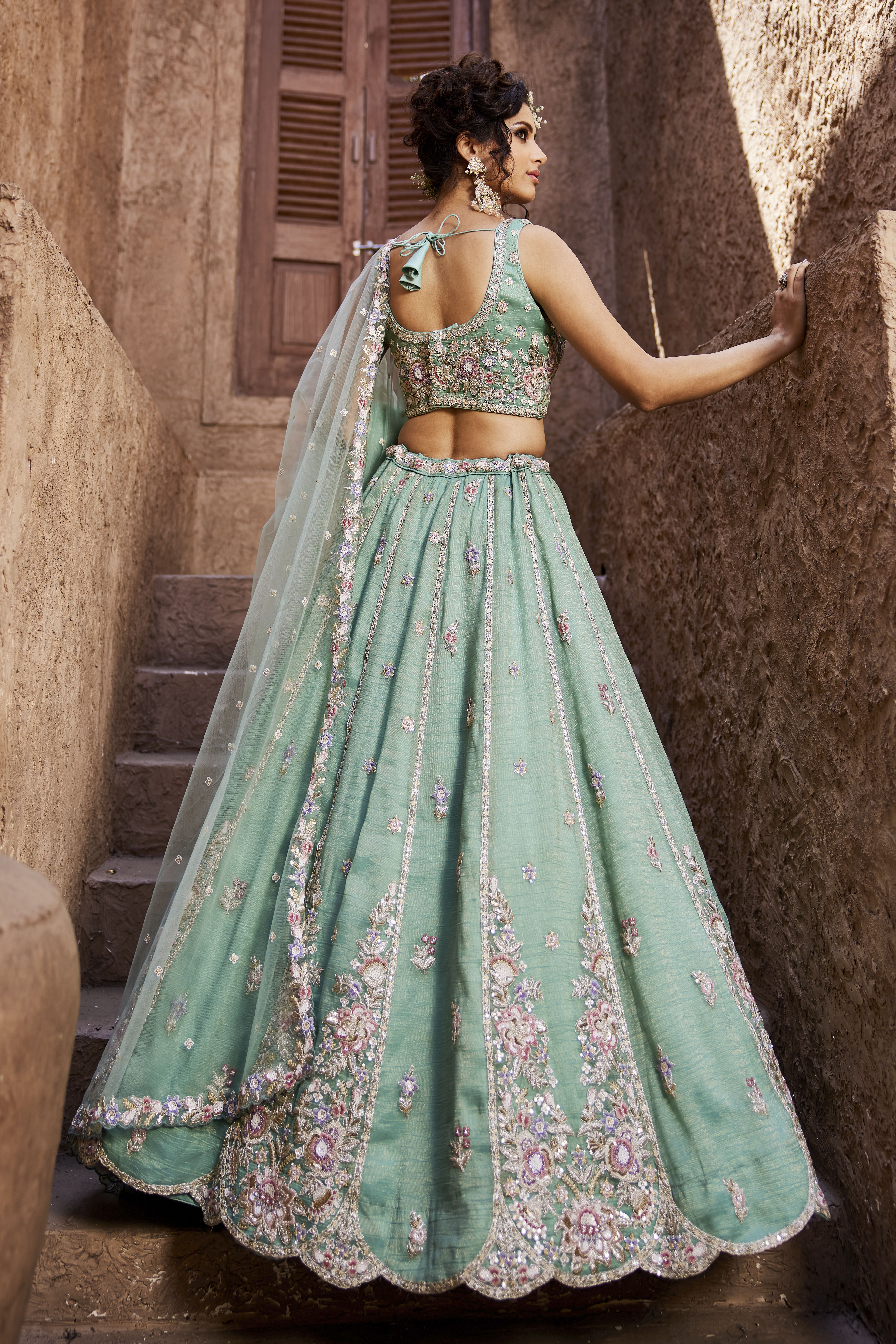 Step into sophistication with this stunning Sea Green Designer Lehenga