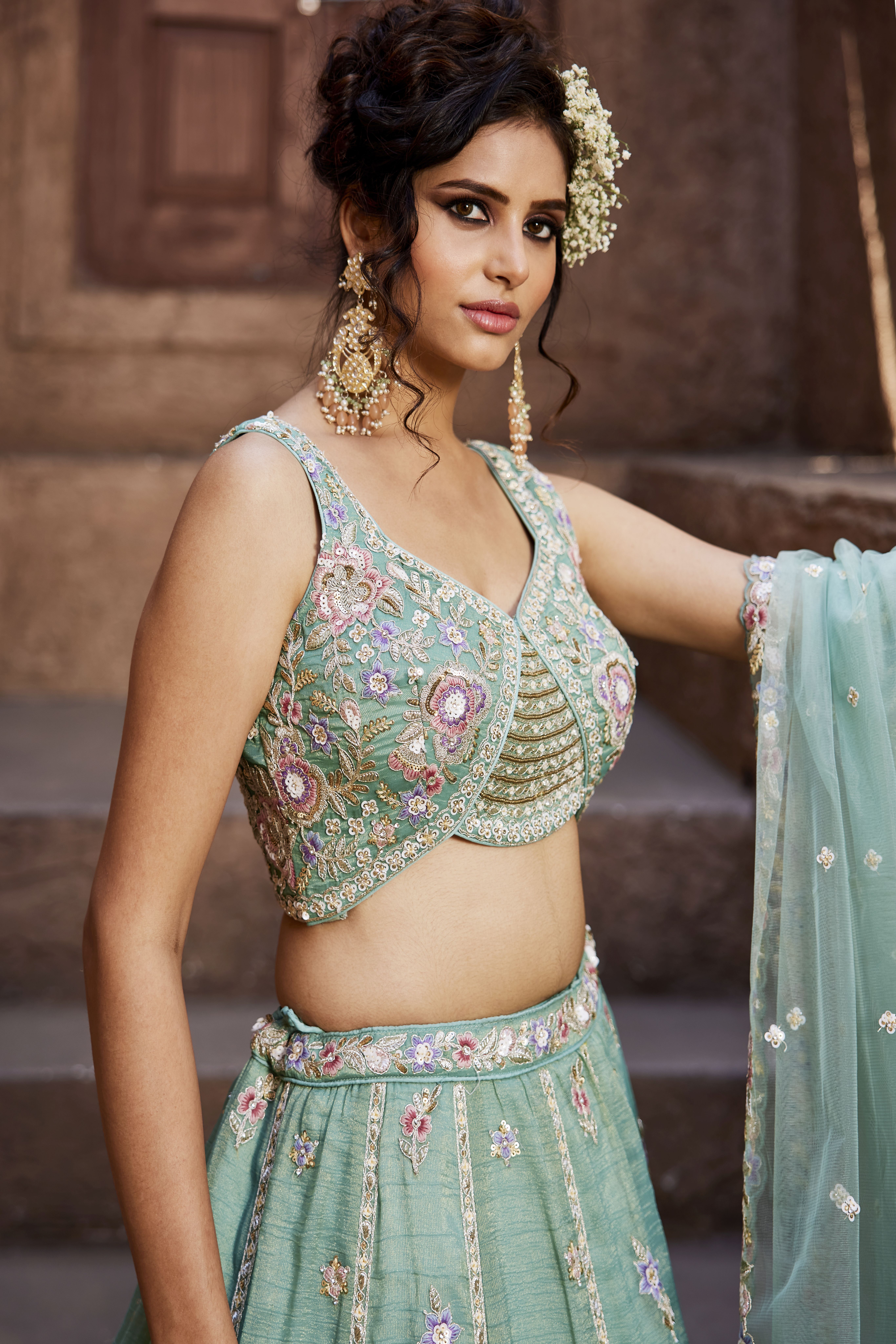 Step into sophistication with this stunning Sea Green Designer Lehenga