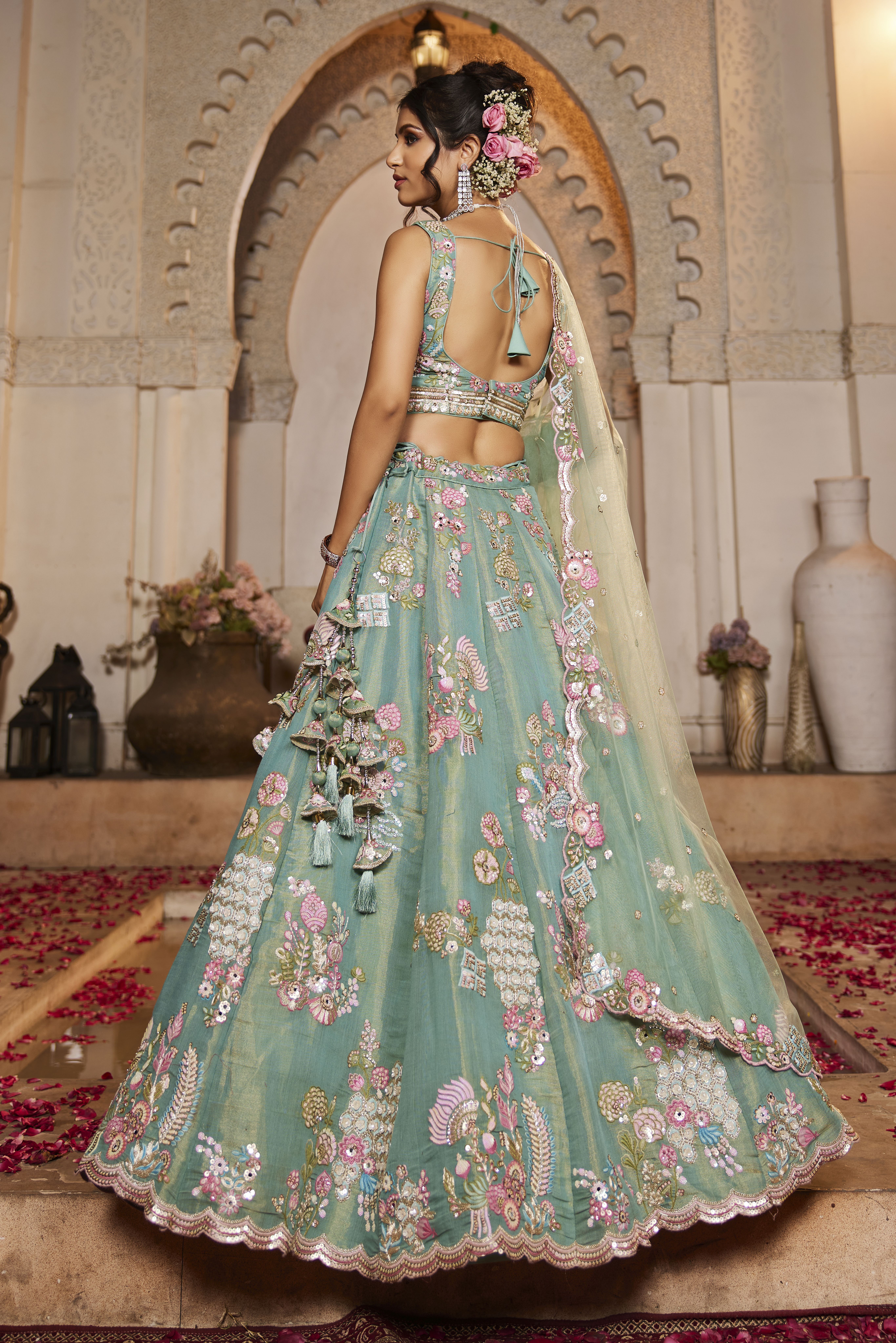 Drape yourself in sheer elegance with this exquisite Sea Green Designer Lehenga