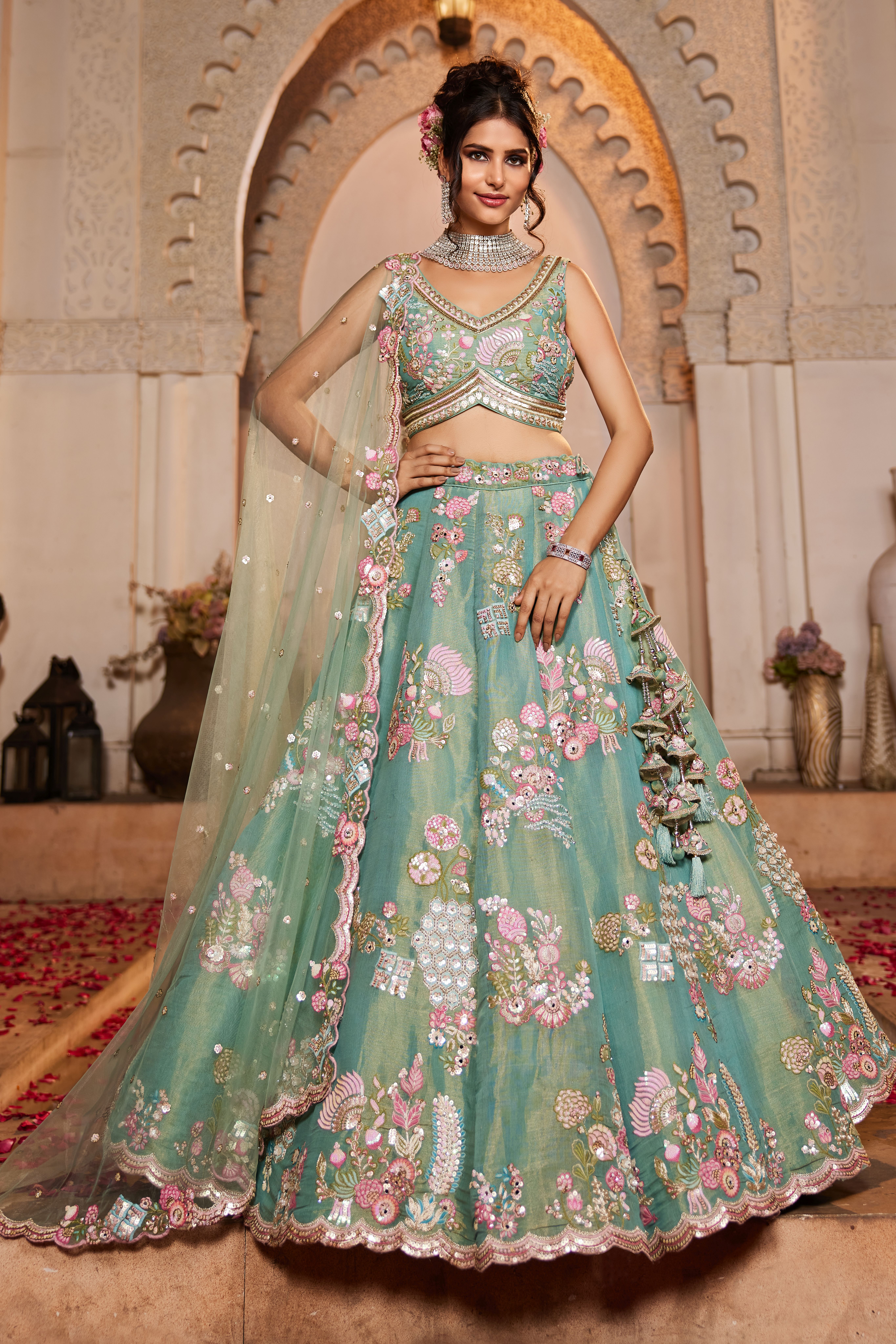 Drape yourself in sheer elegance with this exquisite Sea Green Designer Lehenga
