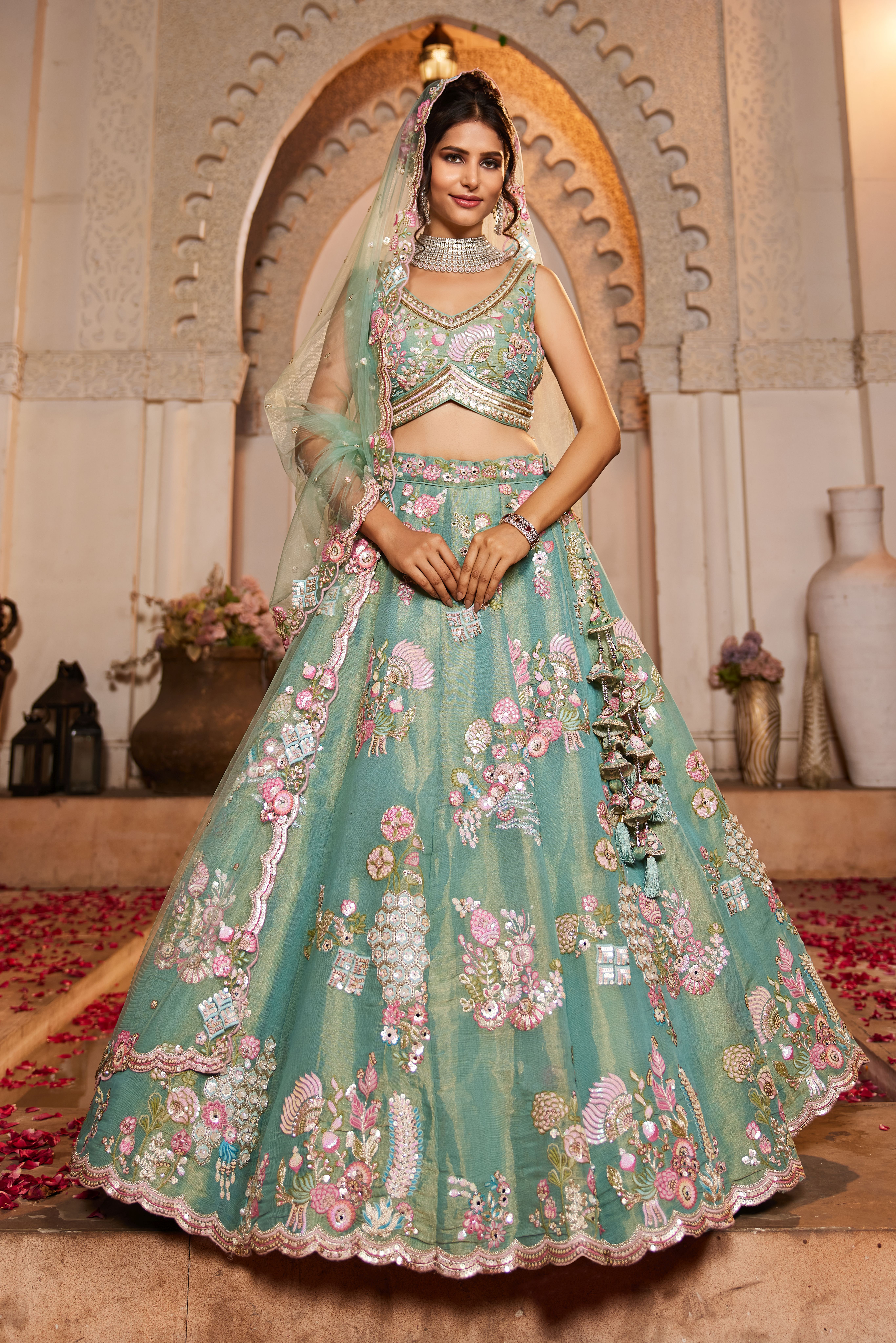 Drape yourself in sheer elegance with this exquisite Sea Green Designer Lehenga