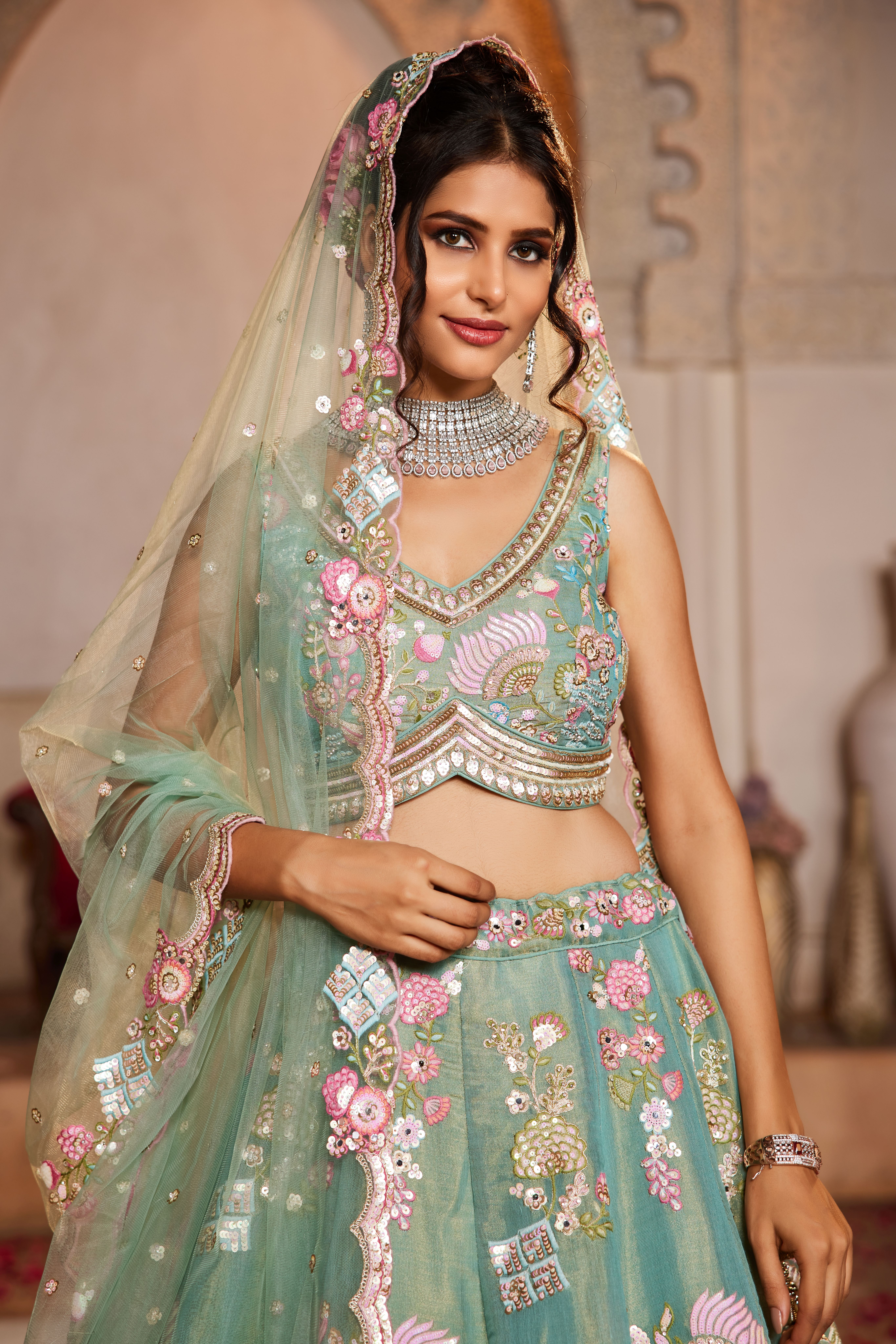 Drape yourself in sheer elegance with this exquisite Sea Green Designer Lehenga