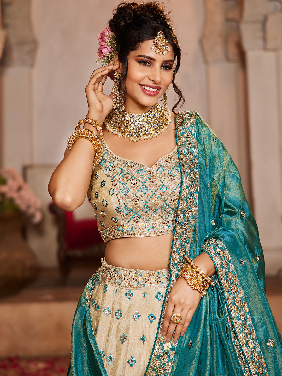 Make a statement as a fashion-forward bridesmaid in this chic cream lehenga set
