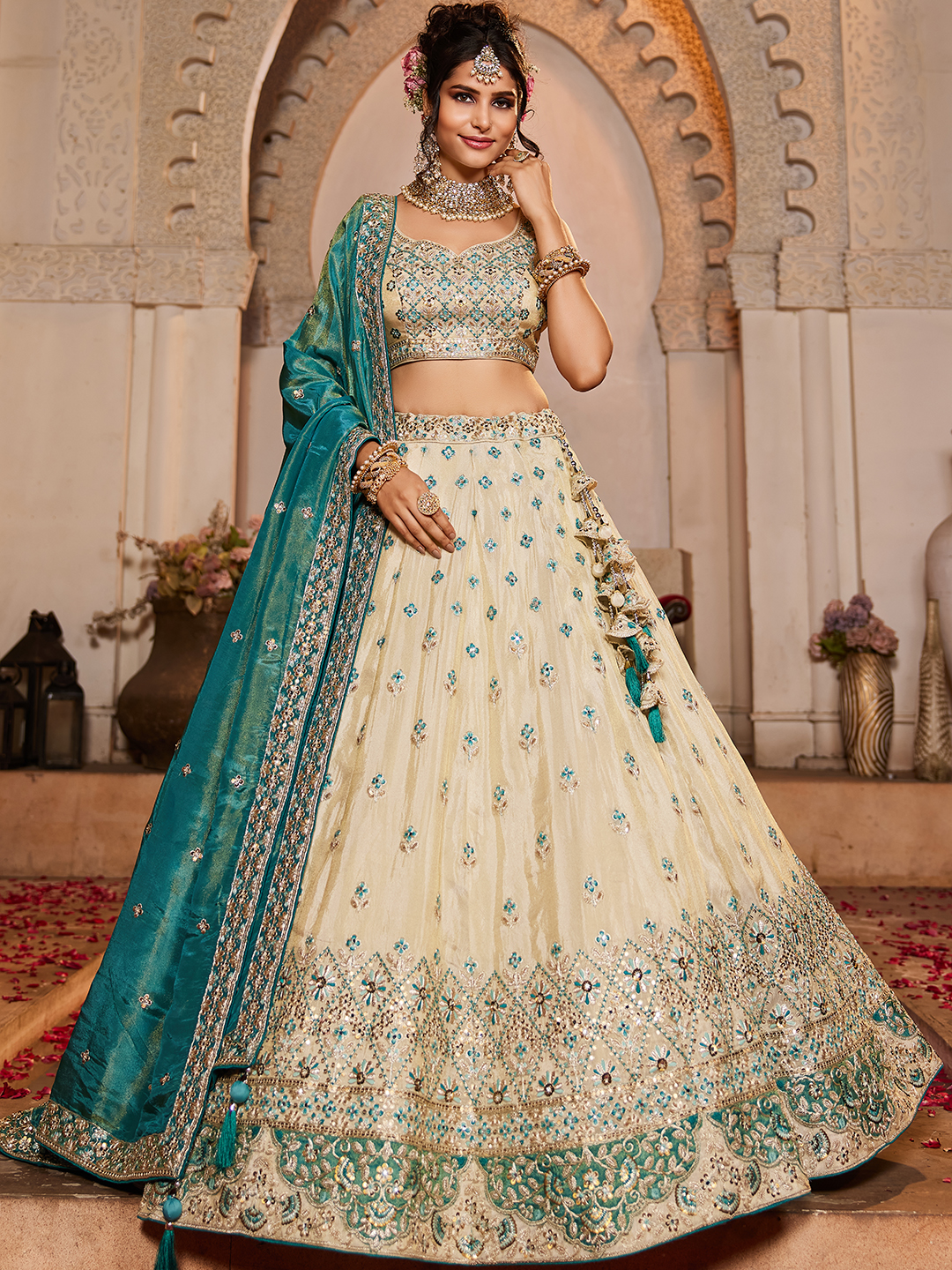 Make a statement as a fashion-forward bridesmaid in this chic cream lehenga set