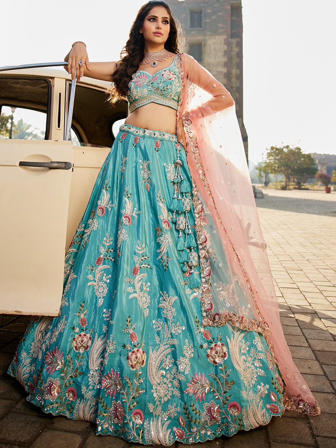 Mesmerizing Turquoise Wedding Lehenga with Elegant Peach Dupatta