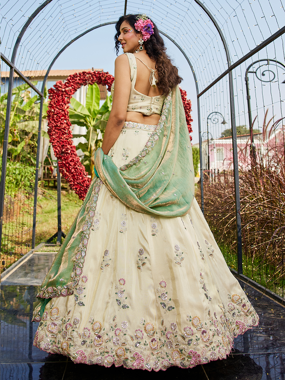 Step into a world of elegance with this regal cream wedding lehenga