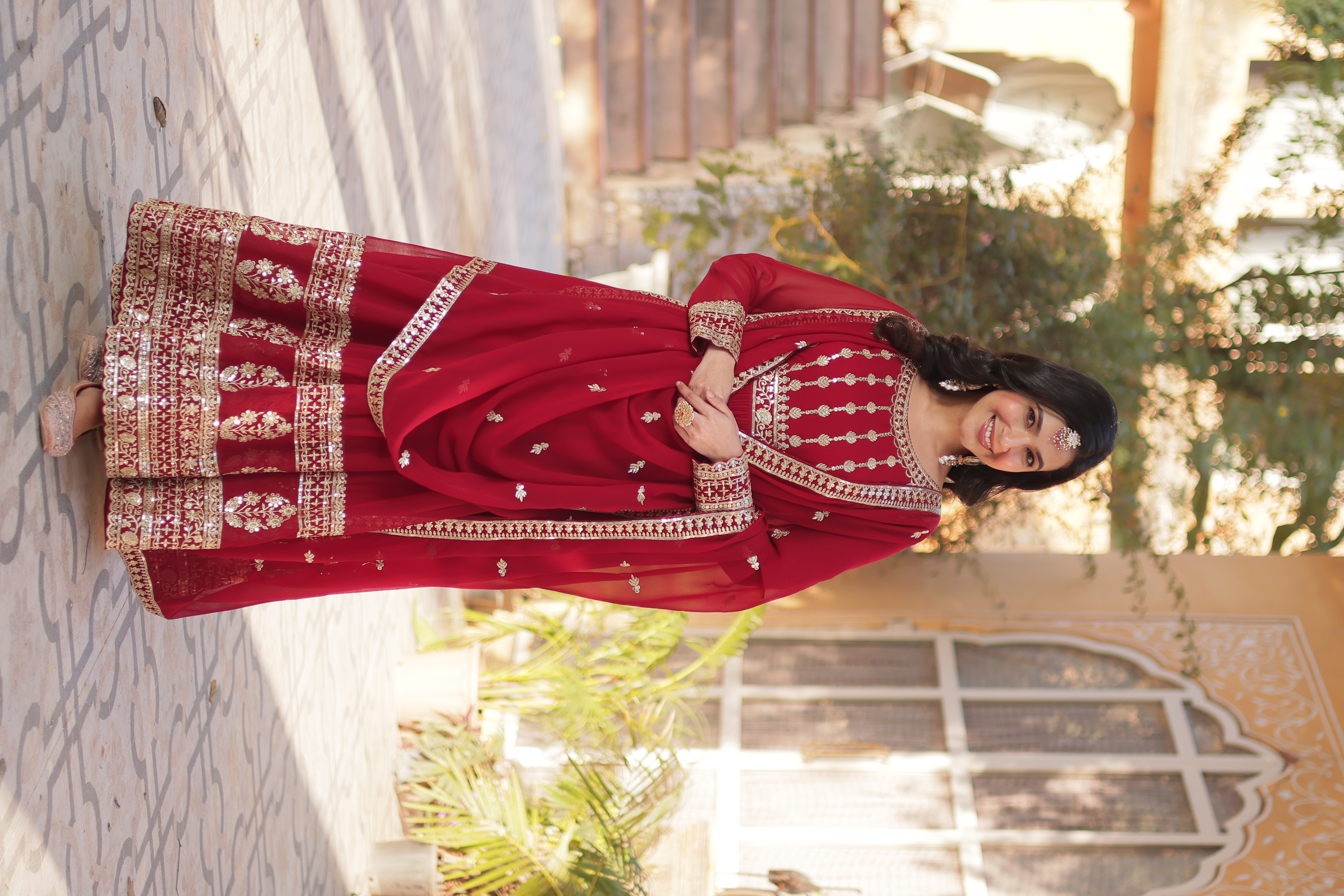 Step into elegance with this Maroon Faux Blooming Salwar Kameez
