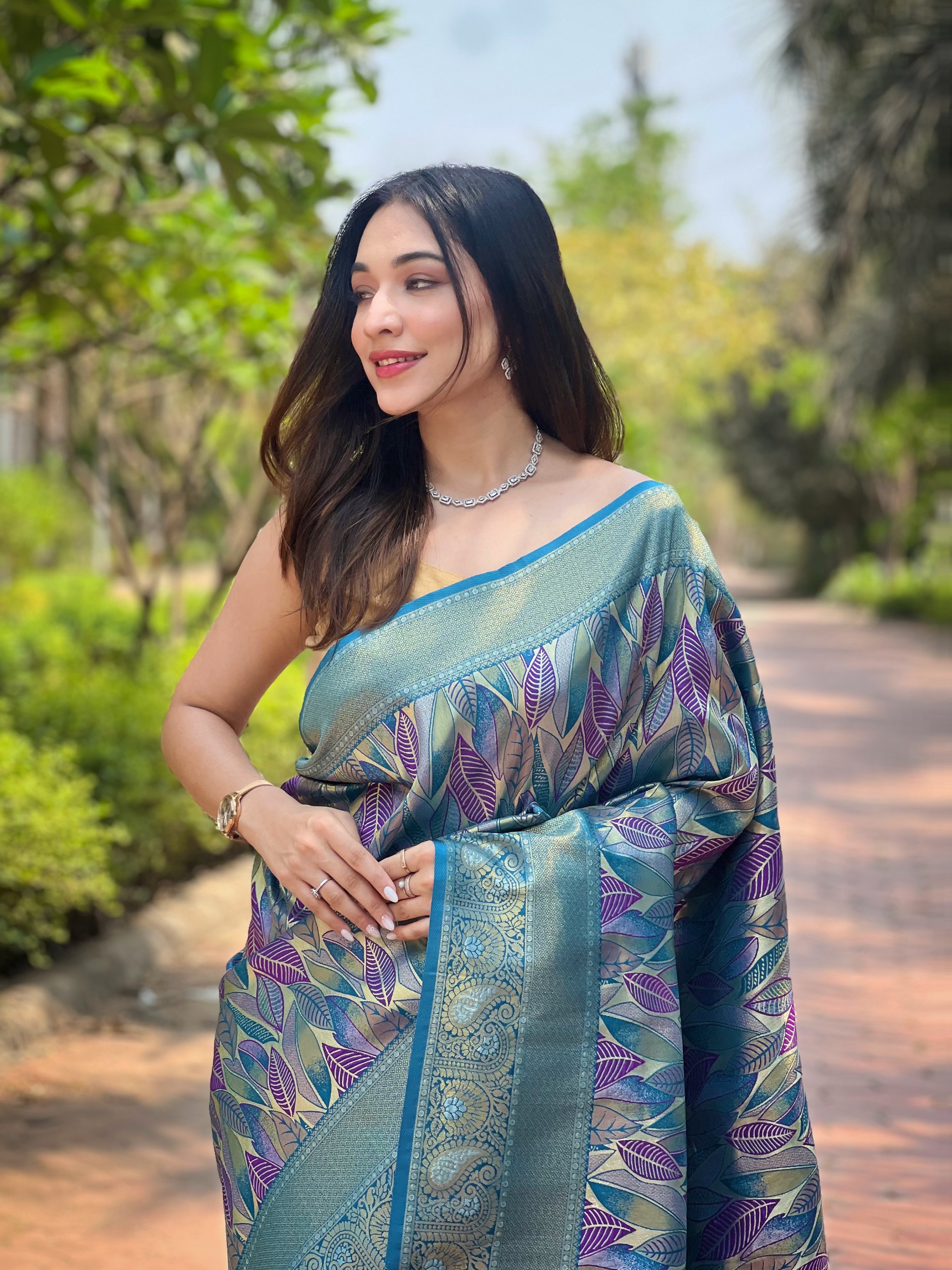 A Majestic Symphony in White Teal Kanchi Pattu Silk Saree