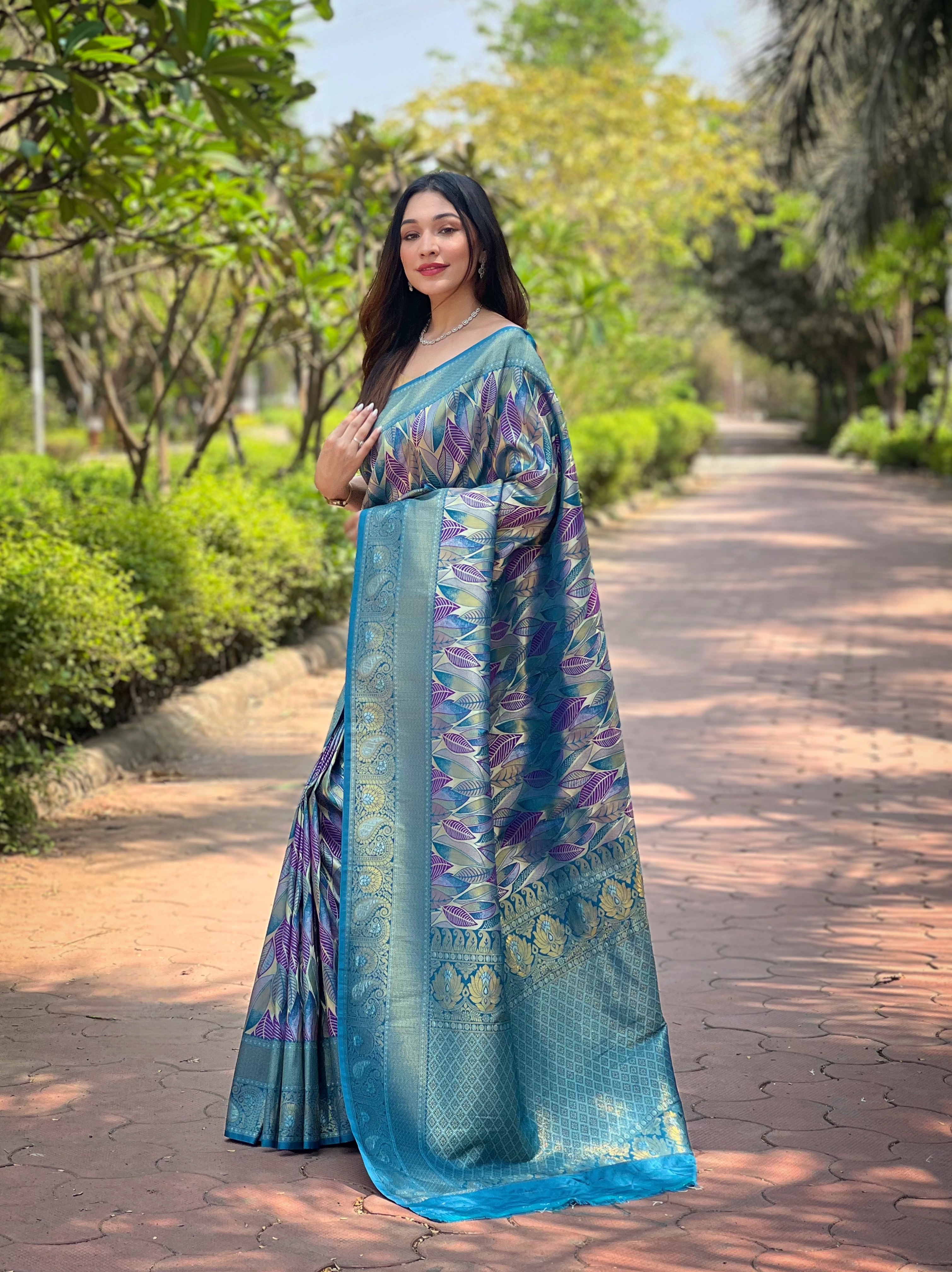 A Majestic Symphony in White Teal Kanchi Pattu Silk Saree
