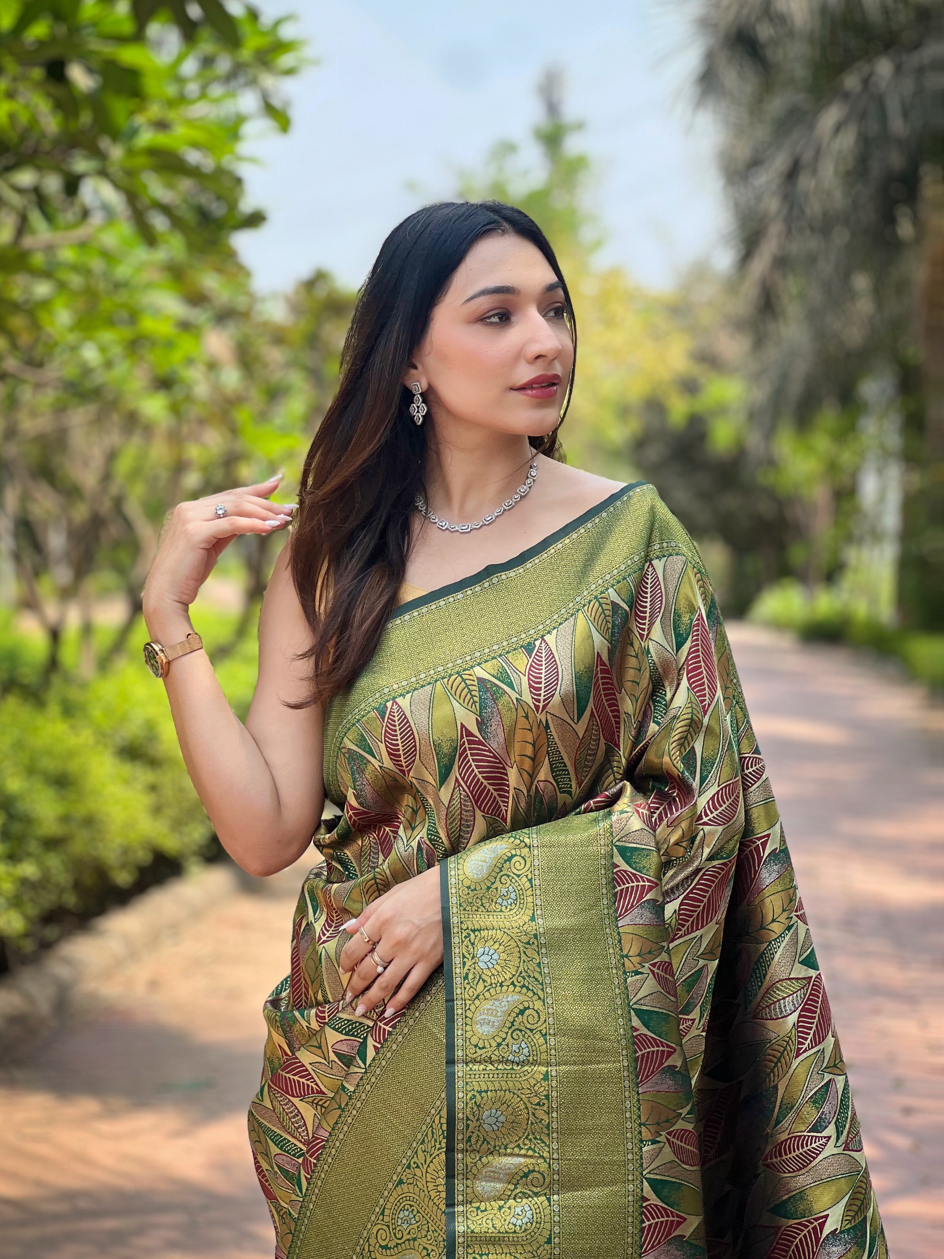 Celebrate heritage craftsmanship with our Mehendi Green Kanchi Pattu Silk Saree