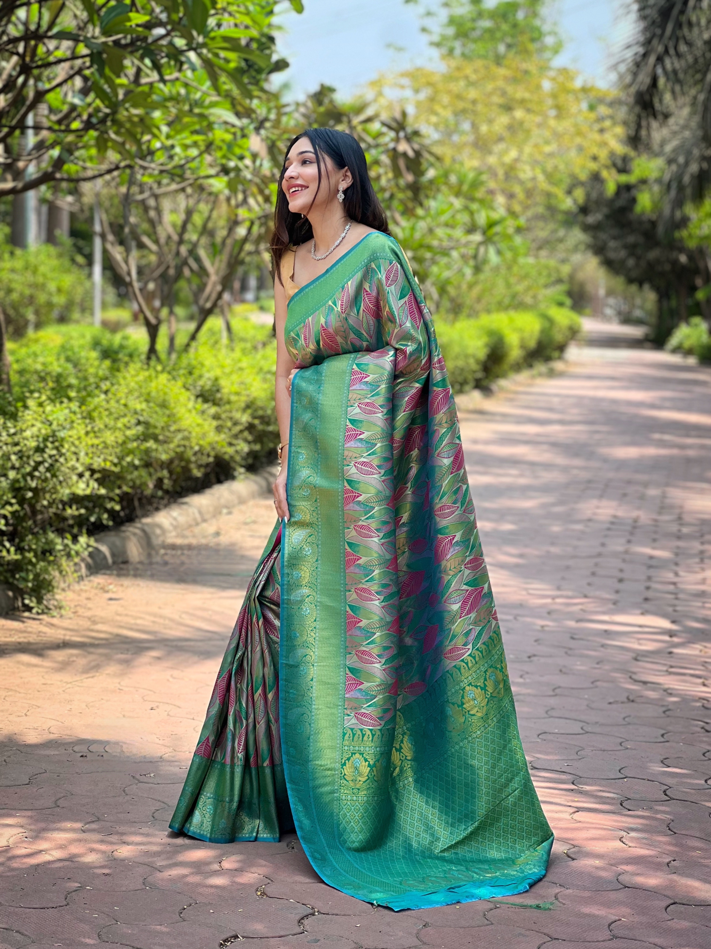 the beauty of tradition with our Sea Green Kanchi Pattu Silk Saree