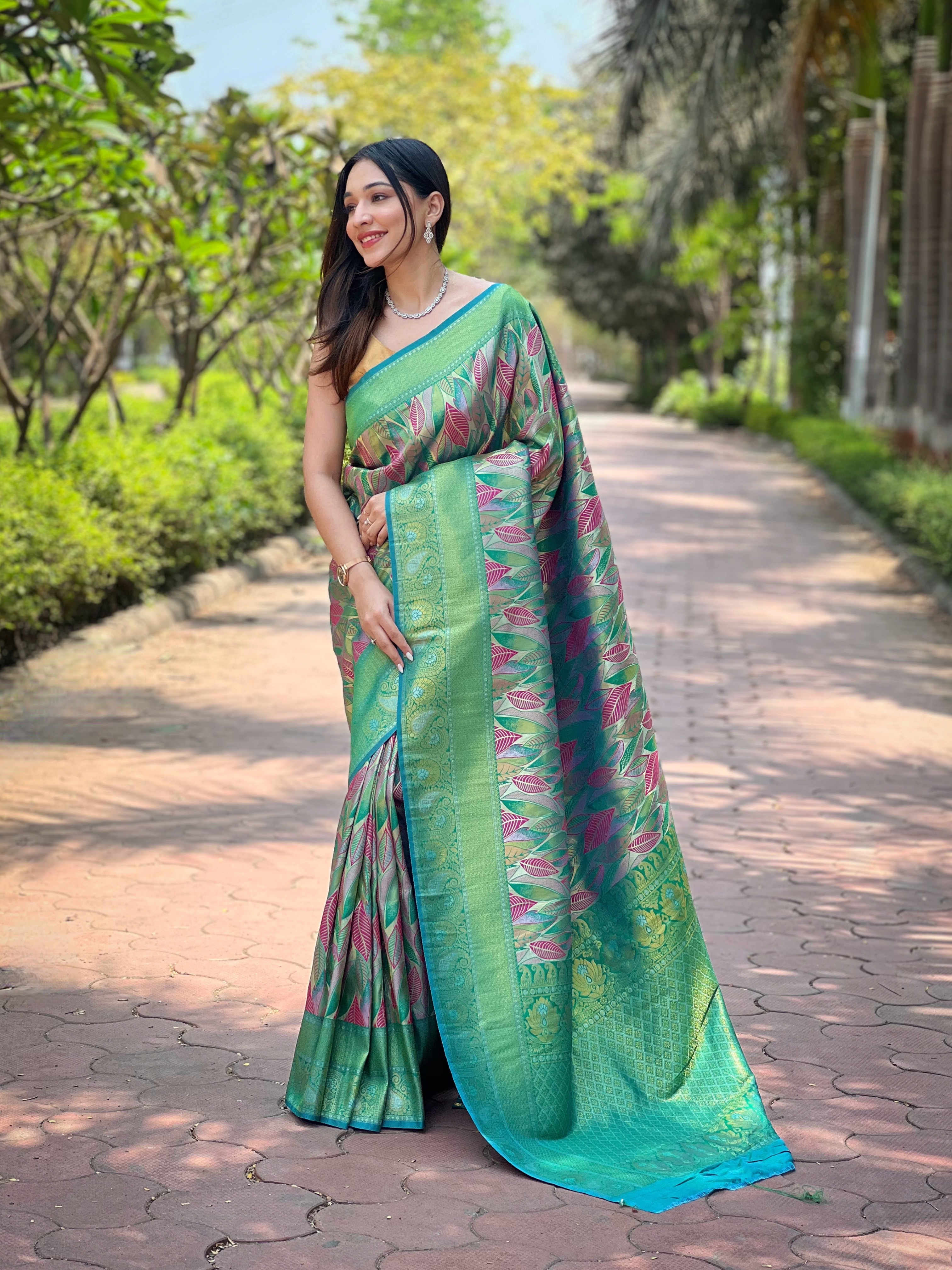 the beauty of tradition with our Sea Green Kanchi Pattu Silk Saree